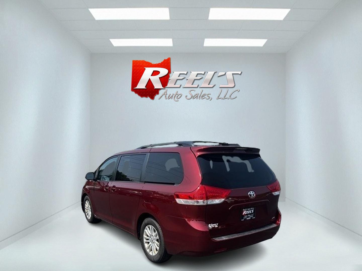 2014 Red /Tan Toyota Sienna (5TDYK3DC2ES) , located at 11115 Chardon Rd. , Chardon, OH, 44024, (440) 214-9705, 41.580246, -81.241943 - Photo#7