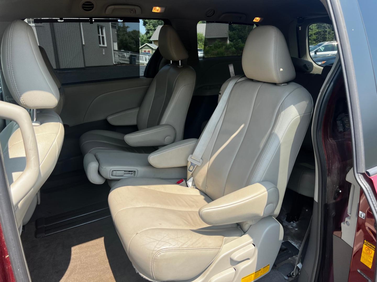 2014 Red /Tan Toyota Sienna (5TDYK3DC2ES) , located at 11115 Chardon Rd. , Chardon, OH, 44024, (440) 214-9705, 41.580246, -81.241943 - This 2014 Toyota Sienna XLE is a versatile and family-friendly minivan equipped with a range of convenience and comfort features. It's powered by a 3.5-liter V6 engine paired with a 6-speed automatic transmission, providing balanced performance for its class. This vehicle's interior comes with a lea - Photo#32