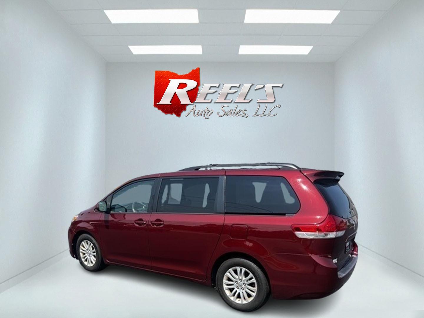 2014 Red /Tan Toyota Sienna (5TDYK3DC2ES) , located at 11115 Chardon Rd. , Chardon, OH, 44024, (440) 214-9705, 41.580246, -81.241943 - Photo#8