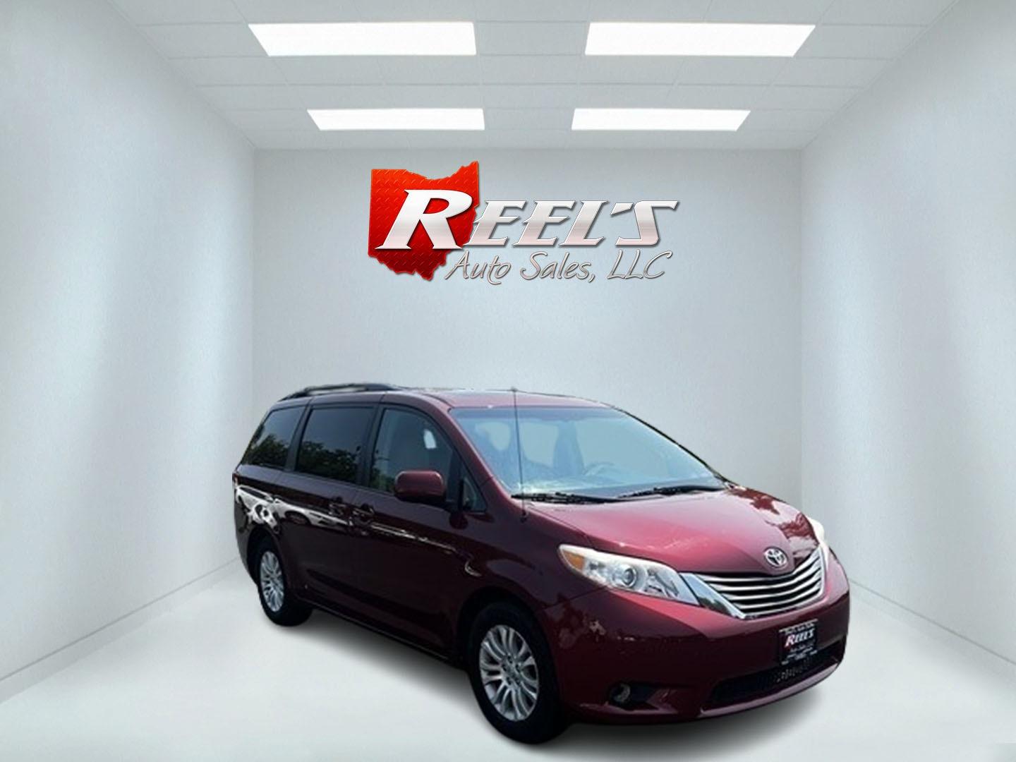 2014 Red /Tan Toyota Sienna (5TDYK3DC2ES) , located at 11115 Chardon Rd. , Chardon, OH, 44024, (440) 214-9705, 41.580246, -81.241943 - Photo#2