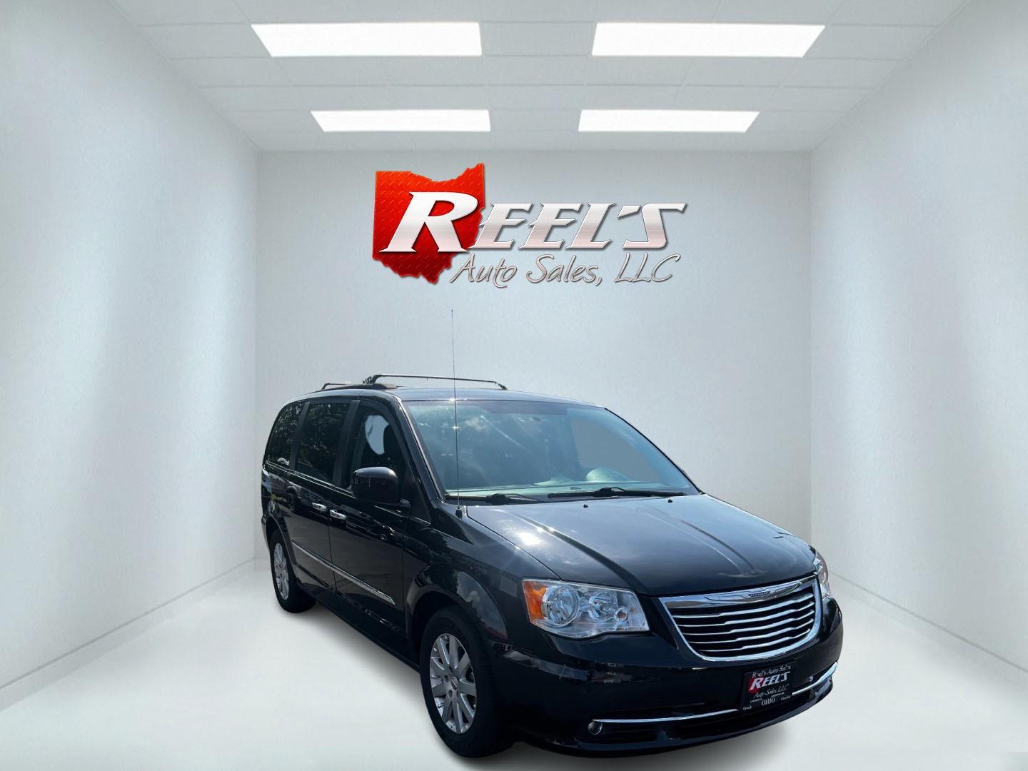 2016 Black /Black Chrysler Town & Country Touring (2C4RC1BG6GR) with an 3.6L V6 DOHC 24V FFV engine, 6A transmission, located at 547 E. Main St., Orwell, OH, 44076, (440) 437-5893, 41.535435, -80.847855 - This 2016 Chrysler Town & Country Touring is a well-equipped minivan designed for family comfort and convenience. It features a powerful 3.6-liter Pentastar V6 engine paired with a 6-speed automatic transmission, offering flex fuel capability and an impressive 500-mile highway driving range. The int - Photo#1