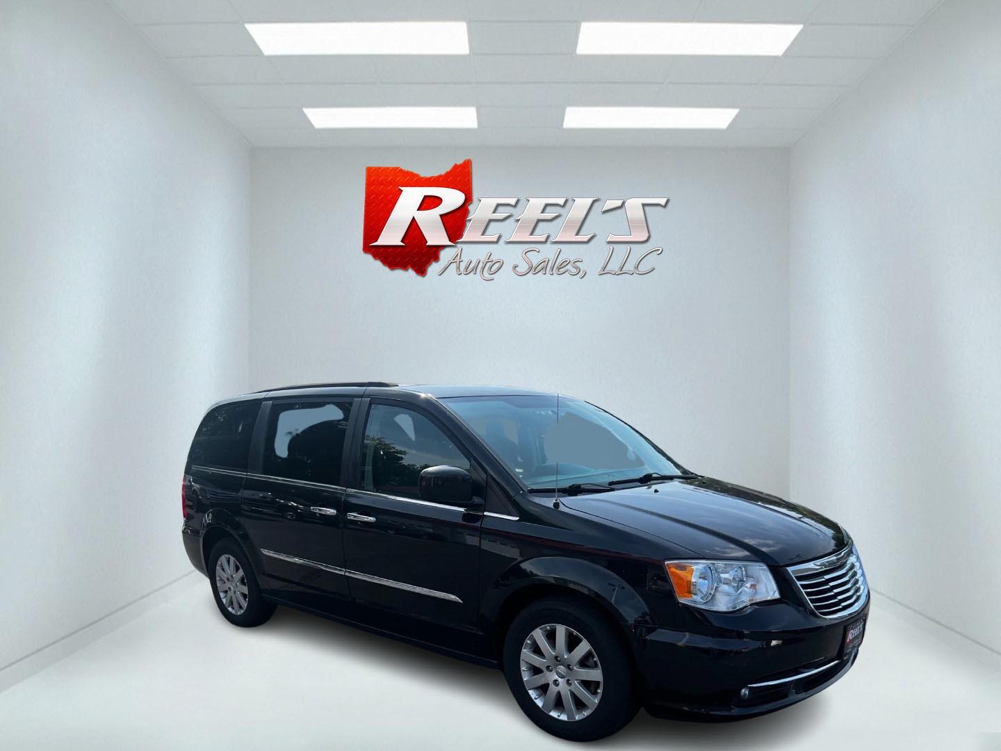 2016 Black /Black Chrysler Town & Country Touring (2C4RC1BG6GR) with an 3.6L V6 DOHC 24V FFV engine, 6A transmission, located at 547 E. Main St., Orwell, OH, 44076, (440) 437-5893, 41.535435, -80.847855 - This 2016 Chrysler Town & Country Touring is a well-equipped minivan designed for family comfort and convenience. It features a powerful 3.6-liter Pentastar V6 engine paired with a 6-speed automatic transmission, offering flex fuel capability and an impressive 500-mile highway driving range. The int - Photo#2