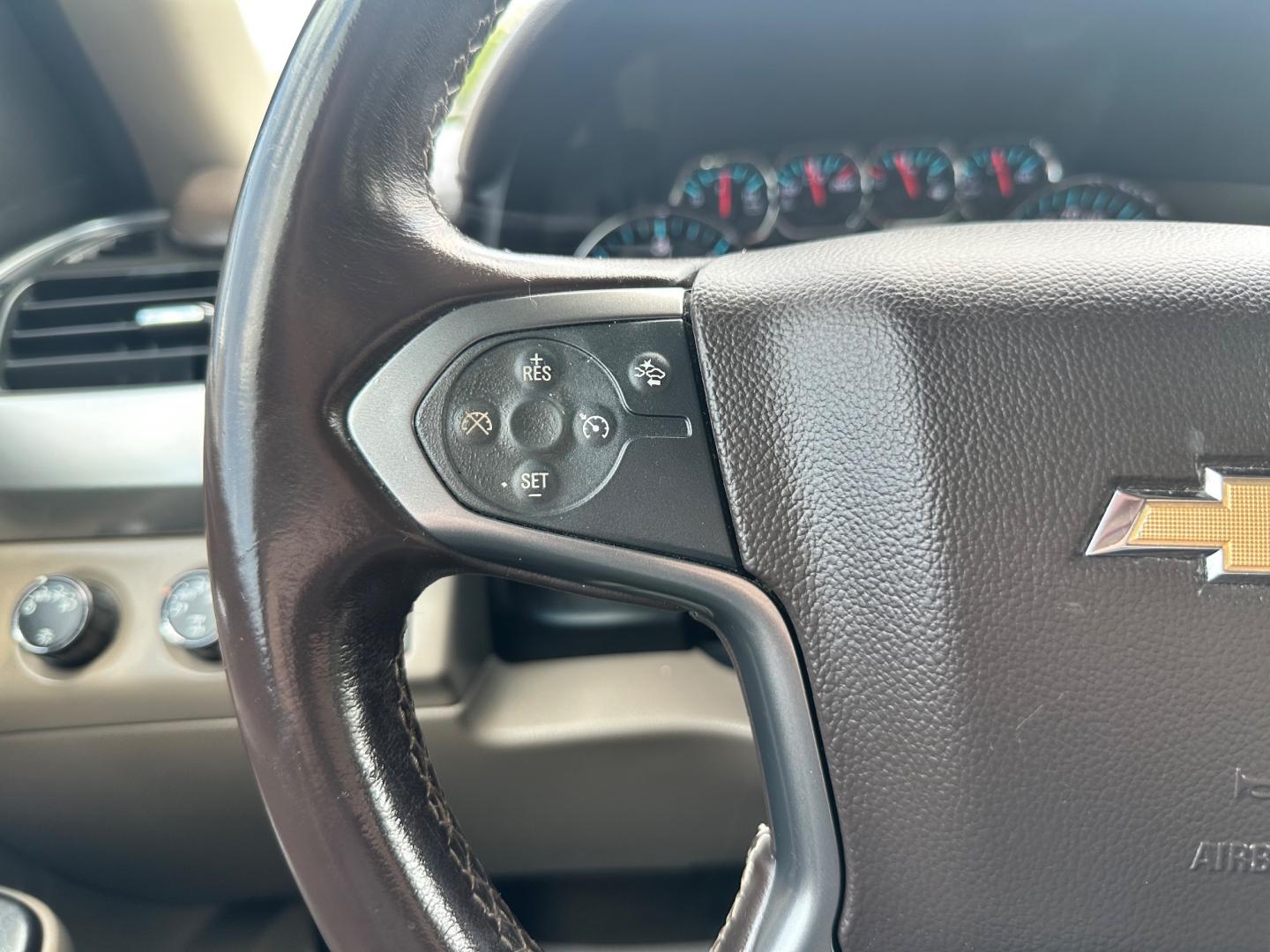 2015 White /Brown Chevrolet Tahoe LT 4WD (1GNSKBKC8FR) with an 5.3L V8 OHV 16V engine, 6-Speed Automatic transmission, located at 11115 Chardon Rd. , Chardon, OH, 44024, (440) 214-9705, 41.580246, -81.241943 - This 2015 Chevrolet Tahoe LT 4WD is a well-equipped full-size SUV that offers a blend of power, comfort, and advanced safety features. It's powered by a robust 5.3-liter Vortec V8 engine producing 355 horsepower and 383 lb-ft of torque, paired with a 6-speed automatic transmission. The 4WD system an - Photo#17