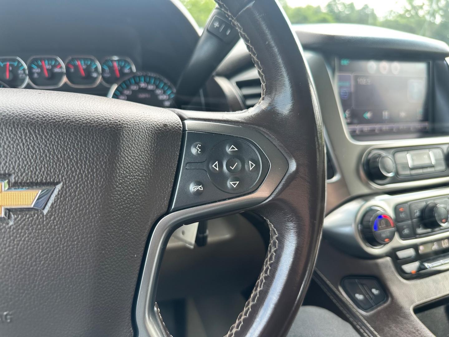 2015 White /Brown Chevrolet Tahoe LT 4WD (1GNSKBKC8FR) with an 5.3L V8 OHV 16V engine, 6-Speed Automatic transmission, located at 11115 Chardon Rd. , Chardon, OH, 44024, (440) 214-9705, 41.580246, -81.241943 - This 2015 Chevrolet Tahoe LT 4WD is a well-equipped full-size SUV that offers a blend of power, comfort, and advanced safety features. It's powered by a robust 5.3-liter Vortec V8 engine producing 355 horsepower and 383 lb-ft of torque, paired with a 6-speed automatic transmission. The 4WD system an - Photo#15