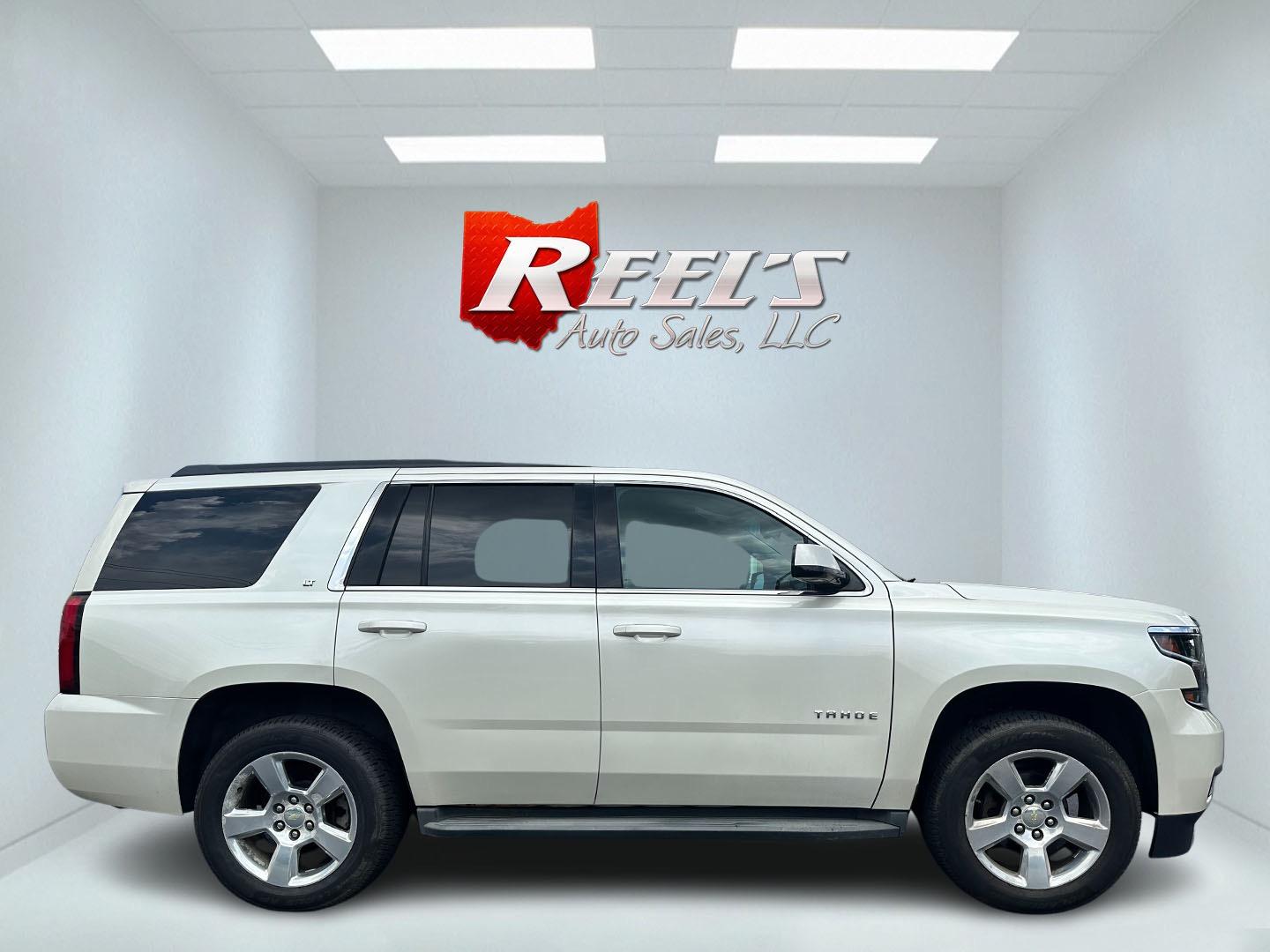 2015 White /Brown Chevrolet Tahoe LT 4WD (1GNSKBKC8FR) with an 5.3L V8 OHV 16V engine, 6-Speed Automatic transmission, located at 11115 Chardon Rd. , Chardon, OH, 44024, (440) 214-9705, 41.580246, -81.241943 - Photo#4