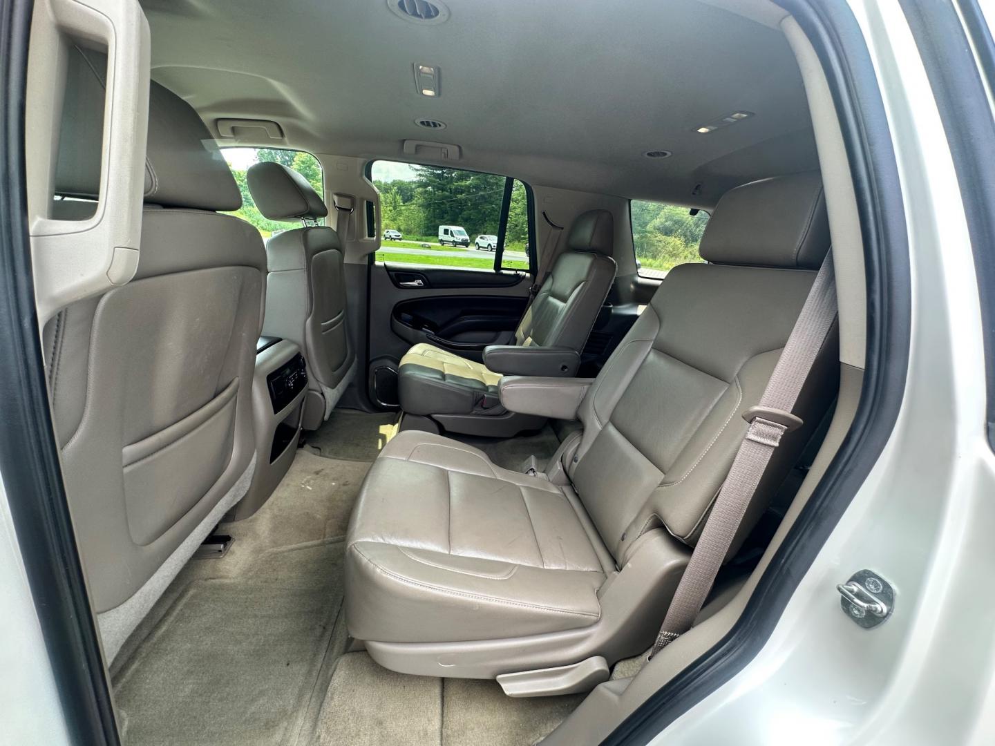 2015 White /Brown Chevrolet Tahoe LT 4WD (1GNSKBKC8FR) with an 5.3L V8 OHV 16V engine, 6-Speed Automatic transmission, located at 11115 Chardon Rd. , Chardon, OH, 44024, (440) 214-9705, 41.580246, -81.241943 - This 2015 Chevrolet Tahoe LT 4WD is a well-equipped full-size SUV that offers a blend of power, comfort, and advanced safety features. It's powered by a robust 5.3-liter Vortec V8 engine producing 355 horsepower and 383 lb-ft of torque, paired with a 6-speed automatic transmission. The 4WD system an - Photo#23