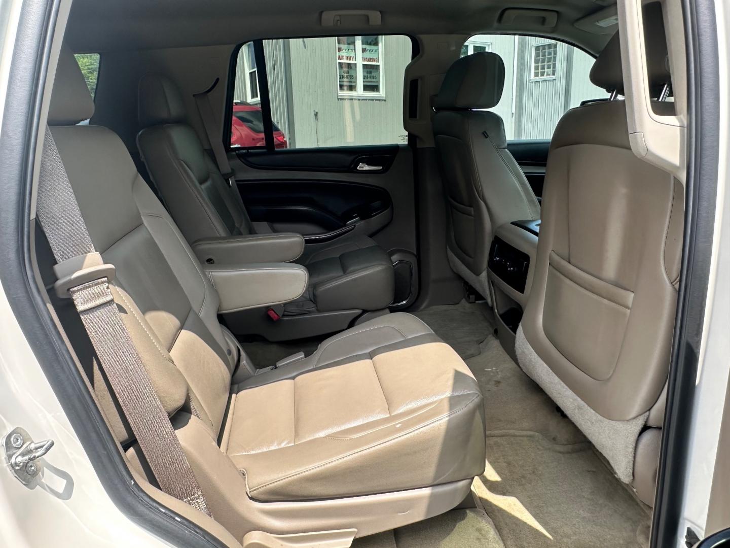 2015 White /Brown Chevrolet Tahoe LT 4WD (1GNSKBKC8FR) with an 5.3L V8 OHV 16V engine, 6-Speed Automatic transmission, located at 11115 Chardon Rd. , Chardon, OH, 44024, (440) 214-9705, 41.580246, -81.241943 - This 2015 Chevrolet Tahoe LT 4WD is a well-equipped full-size SUV that offers a blend of power, comfort, and advanced safety features. It's powered by a robust 5.3-liter Vortec V8 engine producing 355 horsepower and 383 lb-ft of torque, paired with a 6-speed automatic transmission. The 4WD system an - Photo#29