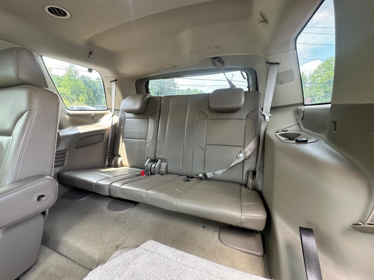 2015 White /Brown Chevrolet Tahoe LT 4WD (1GNSKBKC8FR) with an 5.3L V8 OHV 16V engine, 6-Speed Automatic transmission, located at 11115 Chardon Rd. , Chardon, OH, 44024, (440) 214-9705, 41.580246, -81.241943 - This 2015 Chevrolet Tahoe LT 4WD is a well-equipped full-size SUV that offers a blend of power, comfort, and advanced safety features. It's powered by a robust 5.3-liter Vortec V8 engine producing 355 horsepower and 383 lb-ft of torque, paired with a 6-speed automatic transmission. The 4WD system an - Photo#24