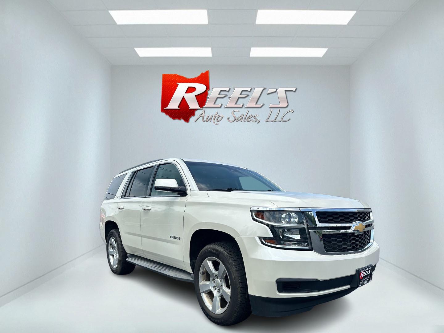 2015 White /Brown Chevrolet Tahoe LT 4WD (1GNSKBKC8FR) with an 5.3L V8 OHV 16V engine, 6-Speed Automatic transmission, located at 11115 Chardon Rd. , Chardon, OH, 44024, (440) 214-9705, 41.580246, -81.241943 - Photo#2