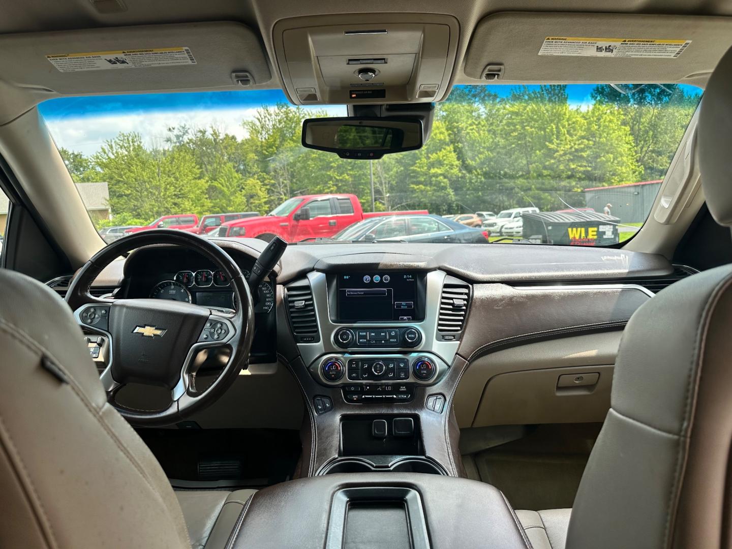 2015 White /Brown Chevrolet Tahoe LT 4WD (1GNSKBKC8FR) with an 5.3L V8 OHV 16V engine, 6-Speed Automatic transmission, located at 11115 Chardon Rd. , Chardon, OH, 44024, (440) 214-9705, 41.580246, -81.241943 - Photo#31