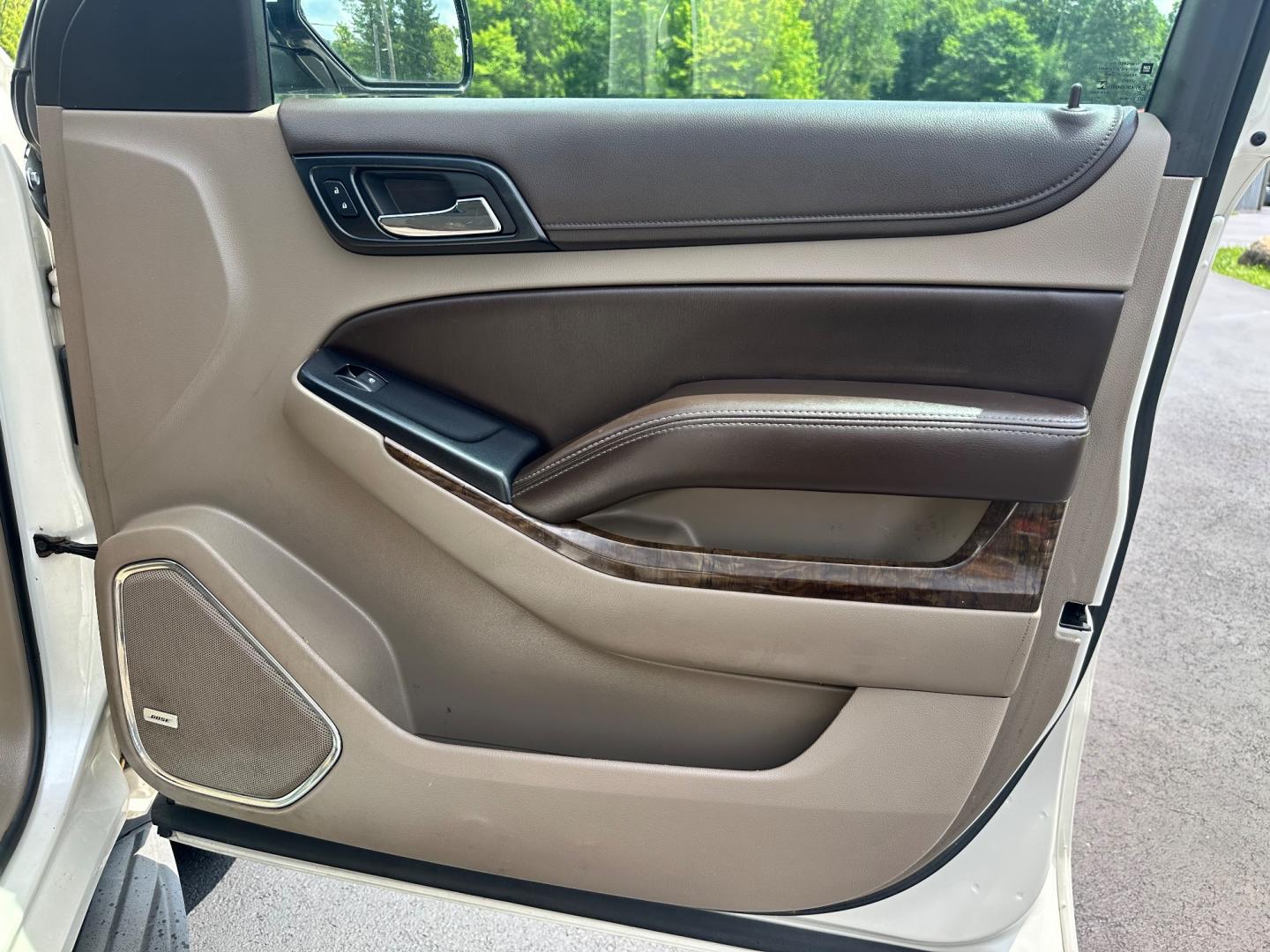 2015 White /Brown Chevrolet Tahoe LT 4WD (1GNSKBKC8FR) with an 5.3L V8 OHV 16V engine, 6-Speed Automatic transmission, located at 11115 Chardon Rd. , Chardon, OH, 44024, (440) 214-9705, 41.580246, -81.241943 - Photo#35