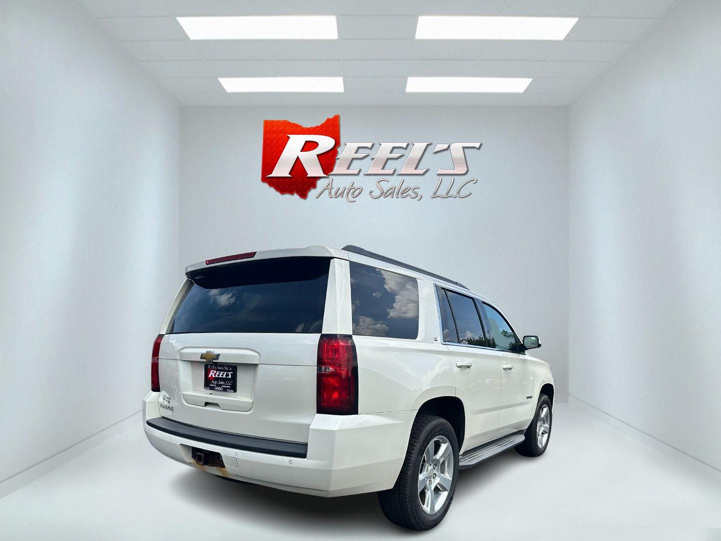 2015 White /Brown Chevrolet Tahoe LT 4WD (1GNSKBKC8FR) with an 5.3L V8 OHV 16V engine, 6-Speed Automatic transmission, located at 11115 Chardon Rd. , Chardon, OH, 44024, (440) 214-9705, 41.580246, -81.241943 - Photo#5