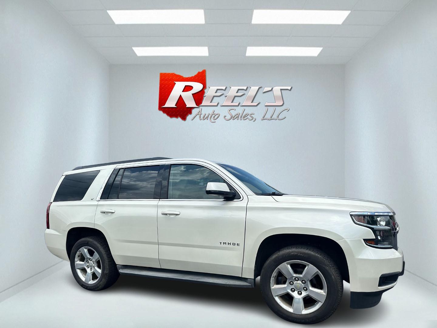 2015 White /Brown Chevrolet Tahoe LT 4WD (1GNSKBKC8FR) with an 5.3L V8 OHV 16V engine, 6-Speed Automatic transmission, located at 11115 Chardon Rd. , Chardon, OH, 44024, (440) 214-9705, 41.580246, -81.241943 - This 2015 Chevrolet Tahoe LT 4WD is a well-equipped full-size SUV that offers a blend of power, comfort, and advanced safety features. It's powered by a robust 5.3-liter Vortec V8 engine producing 355 horsepower and 383 lb-ft of torque, paired with a 6-speed automatic transmission. The 4WD system an - Photo#3