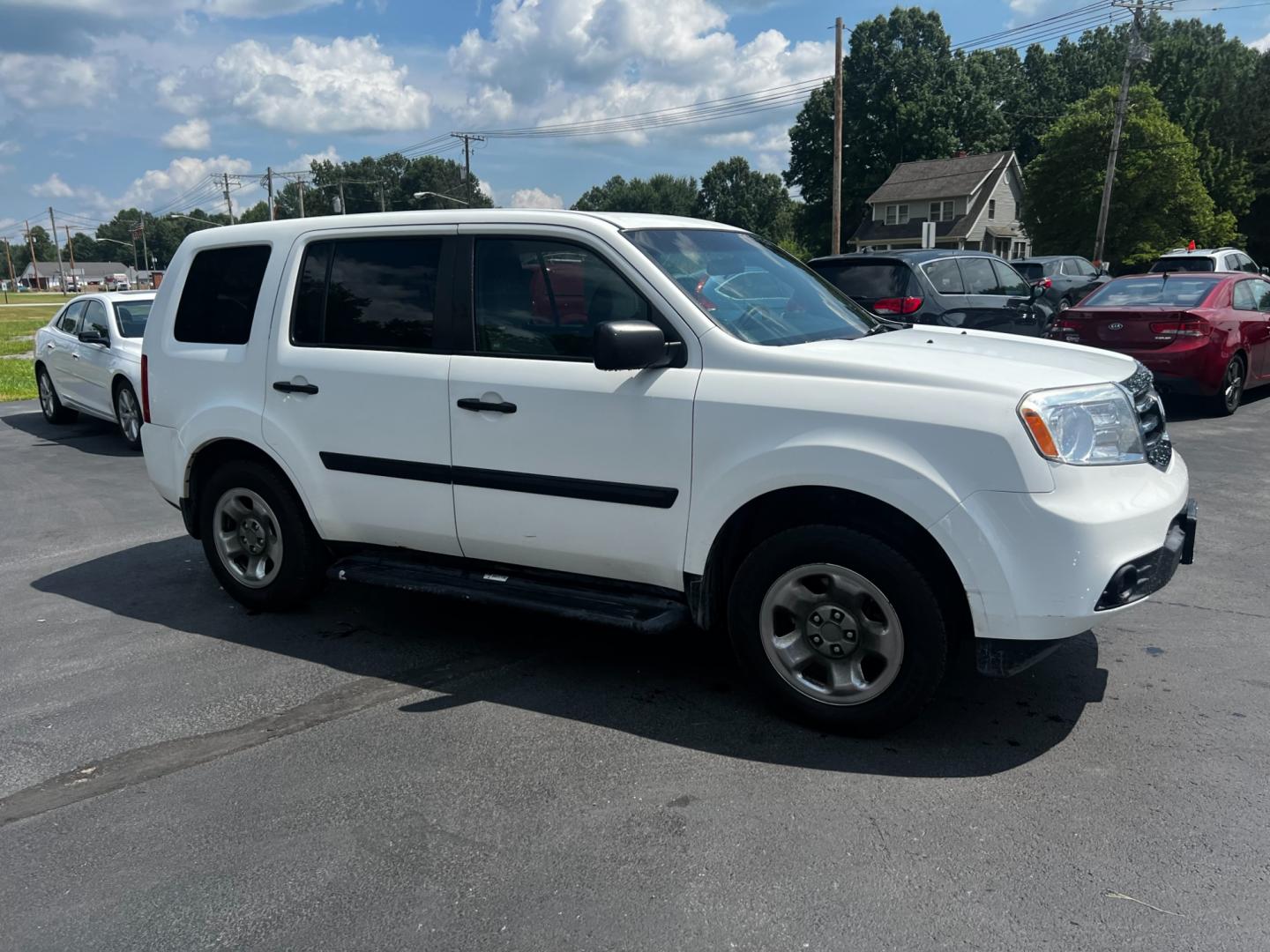 2012 White /Gray Honda Pilot LX 4WD 5-Spd AT (5FNYF4H29CB) with an 3.5L V6 SOHC 24V engine, 5-Speed Automatic transmission, located at 547 E. Main St., Orwell, OH, 44076, (440) 437-5893, 41.535435, -80.847855 - This 2012 Honda Pilot LX 4WD is a midsize SUV that offers reliable performance and numerous convenience features. It is powered by a 3.5 SOHC V6 engine coupled with a 5-speed automatic transmission. The SUV can tow up to 4,500 pounds, offering the VTM-4 lock system for better handling and traction. - Photo#13