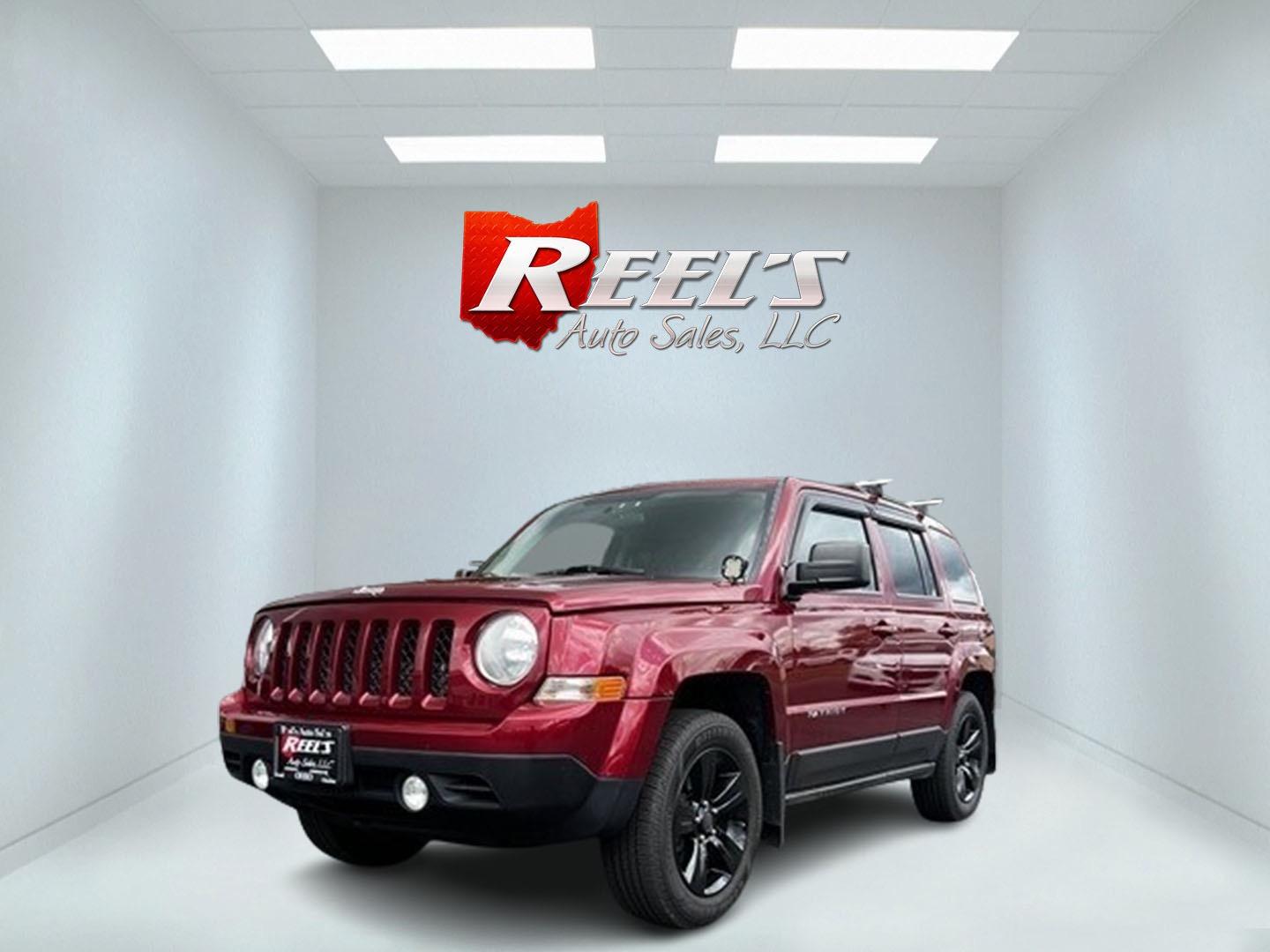 2014 Red /Black Jeep Patriot Latitude 4WD (1C4NJRFB2ED) with an 2.4L I4 DOHC 16V engine, 6 Speed Auto transmission, located at 547 E. Main St., Orwell, OH, 44076, (440) 437-5893, 41.535435, -80.847855 - Photo#0