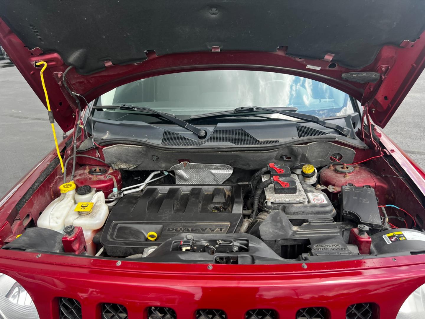 2014 Red /Black Jeep Patriot Latitude 4WD (1C4NJRFB2ED) with an 2.4L I4 DOHC 16V engine, 6 Speed Auto transmission, located at 547 E. Main St., Orwell, OH, 44076, (440) 437-5893, 41.535435, -80.847855 - Photo#13