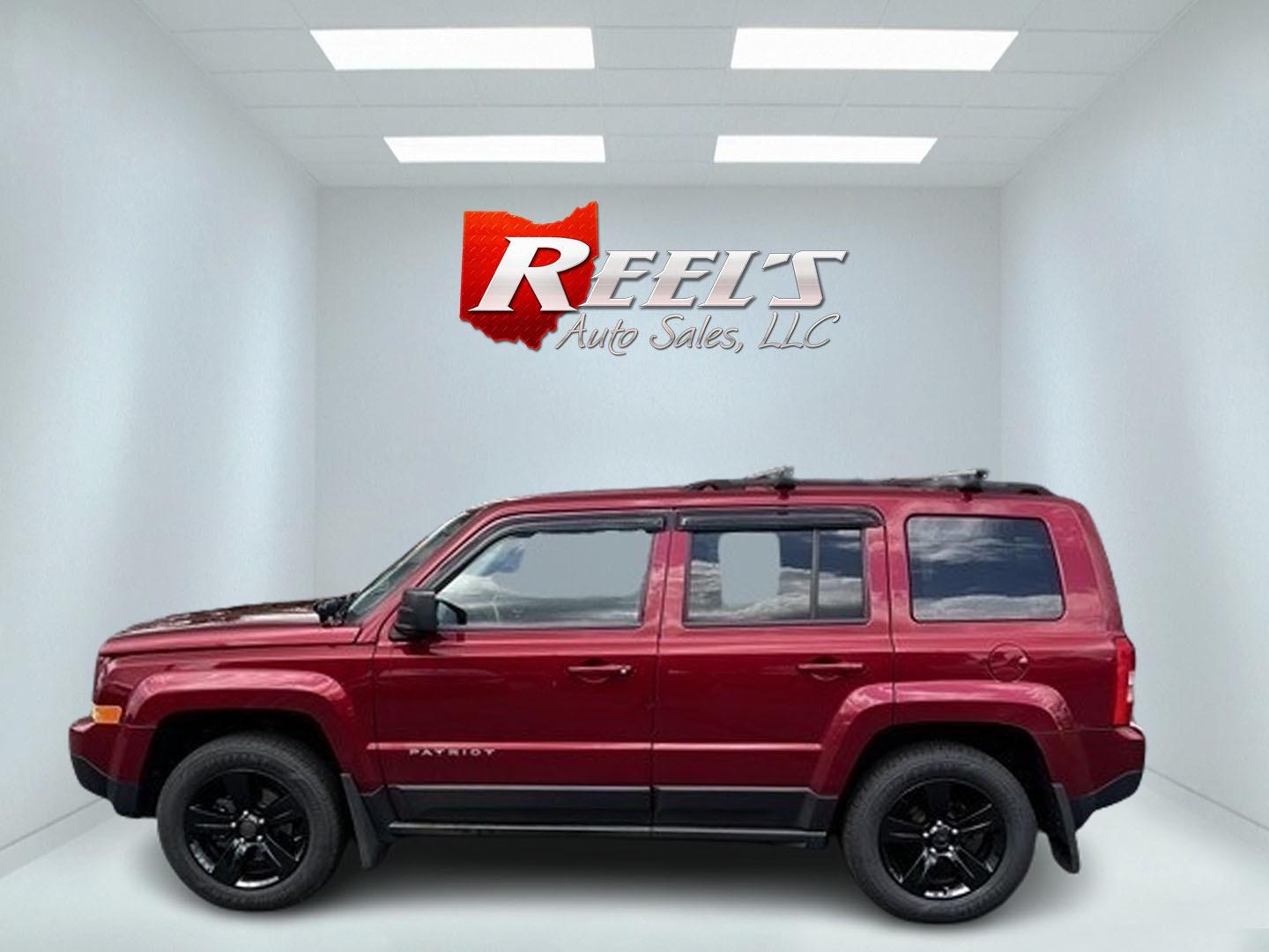 2014 Red /Black Jeep Patriot Latitude 4WD (1C4NJRFB2ED) with an 2.4L I4 DOHC 16V engine, 6 Speed Auto transmission, located at 547 E. Main St., Orwell, OH, 44076, (440) 437-5893, 41.535435, -80.847855 - Photo#8