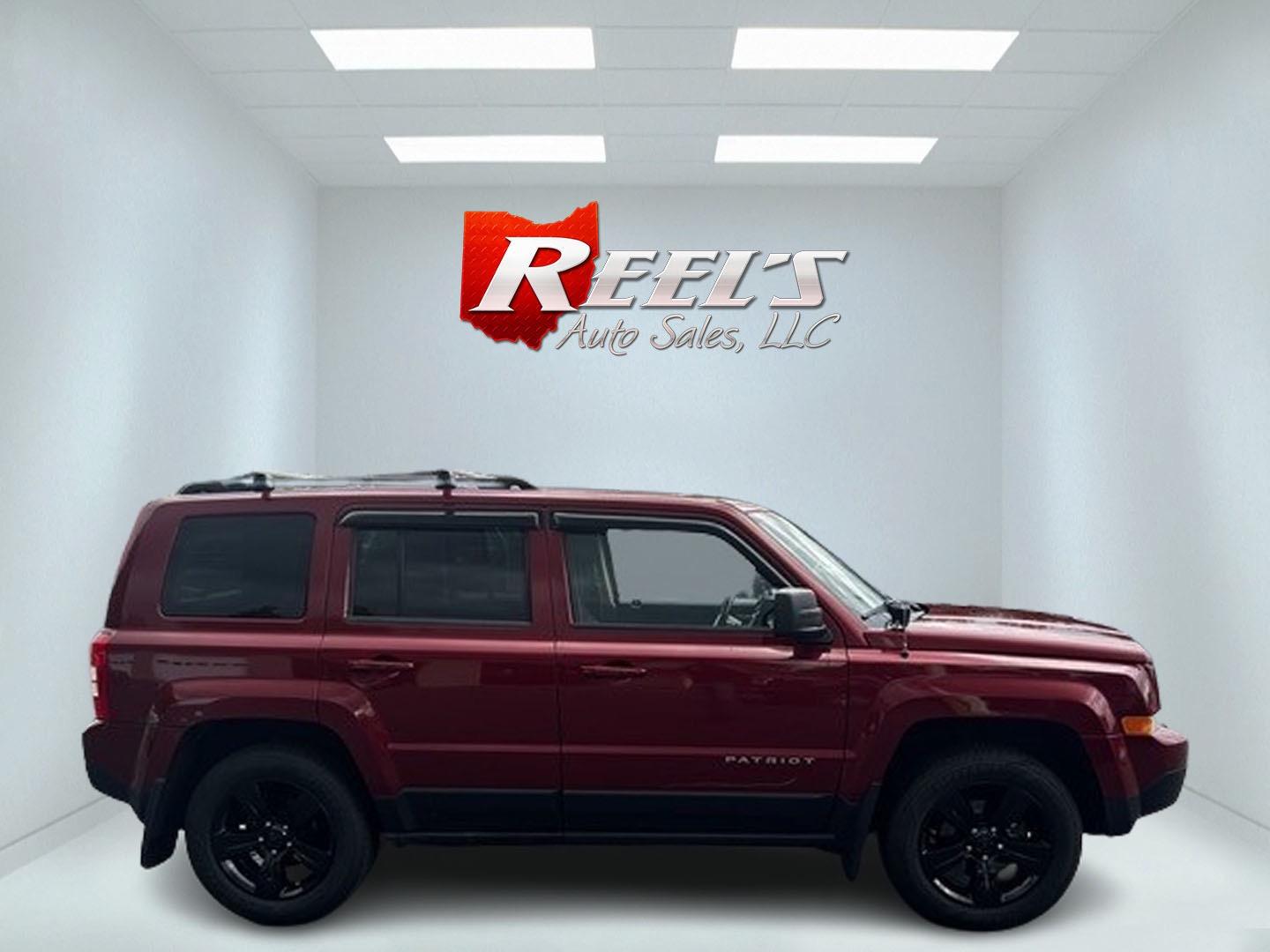 2014 Red /Black Jeep Patriot Latitude 4WD (1C4NJRFB2ED) with an 2.4L I4 DOHC 16V engine, 6 Speed Auto transmission, located at 547 E. Main St., Orwell, OH, 44076, (440) 437-5893, 41.535435, -80.847855 - Photo#3