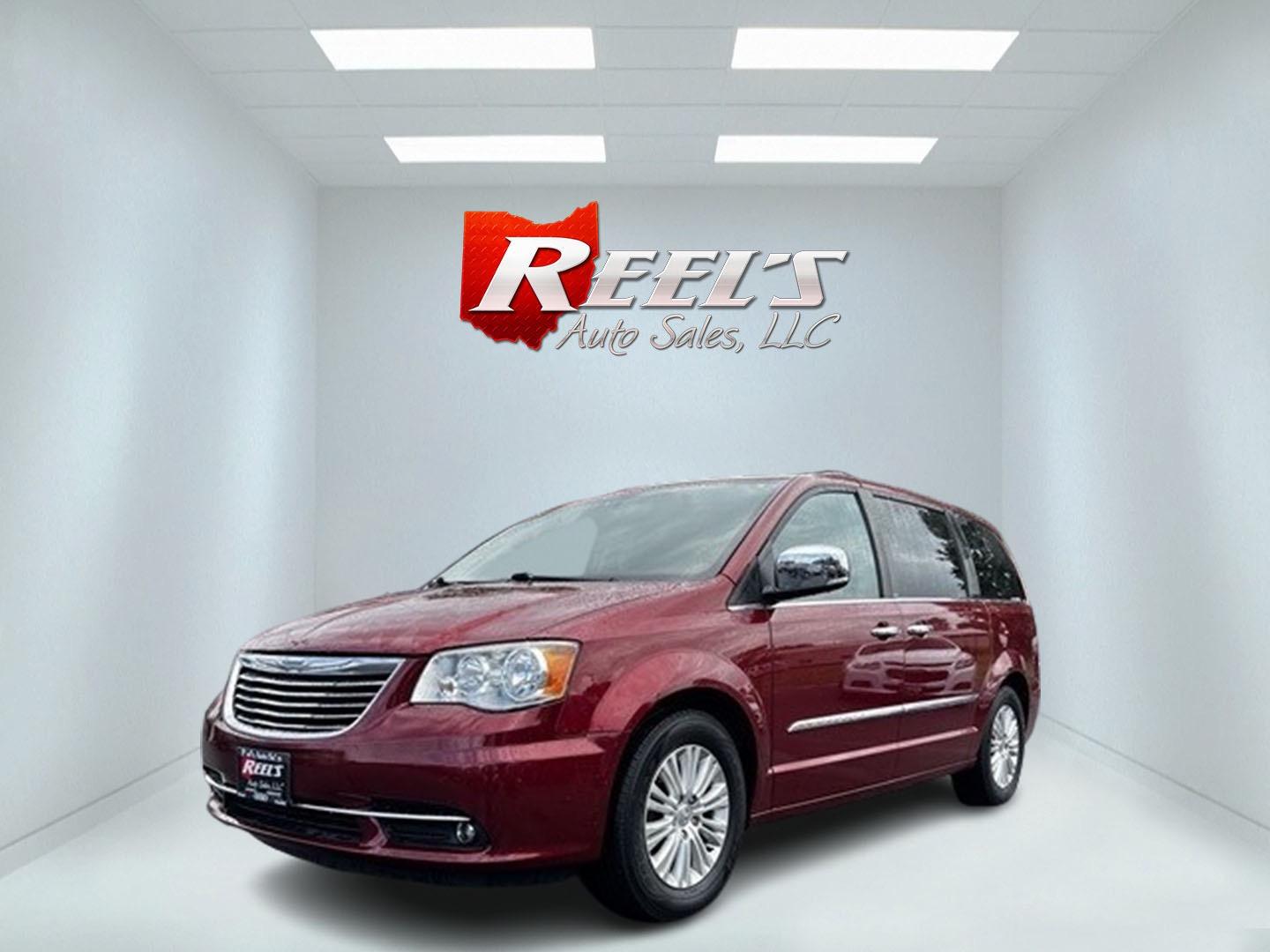 2013 Red /Black Chrysler Town & Country Touring-L (2C4RC1CG4DR) with an 3.6L V6 DOHC 24V FFV engine, 6-Speed Automatic transmission, located at 547 E. Main St., Orwell, OH, 44076, (440) 437-5893, 41.535435, -80.847855 - This 2013 Chrysler Town & Country Touring-L is a well-equipped minivan that offers a blend of luxury, convenience, and safety features. It's powered by a 3.6-liter Pentastar V6 engine paired with a 6-speed automatic transmission, and is flex-fuel capable. The luxurious interior boasts leather uphols - Photo#0