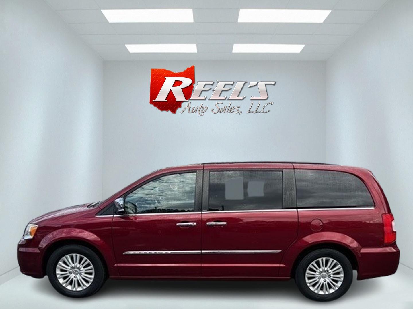 2013 Red /Black Chrysler Town & Country Touring-L (2C4RC1CG4DR) with an 3.6L V6 DOHC 24V FFV engine, 6-Speed Automatic transmission, located at 547 E. Main St., Orwell, OH, 44076, (440) 437-5893, 41.535435, -80.847855 - This 2013 Chrysler Town & Country Touring-L is a well-equipped minivan that offers a blend of luxury, convenience, and safety features. It's powered by a 3.6-liter Pentastar V6 engine paired with a 6-speed automatic transmission, and is flex-fuel capable. The luxurious interior boasts leather uphols - Photo#8