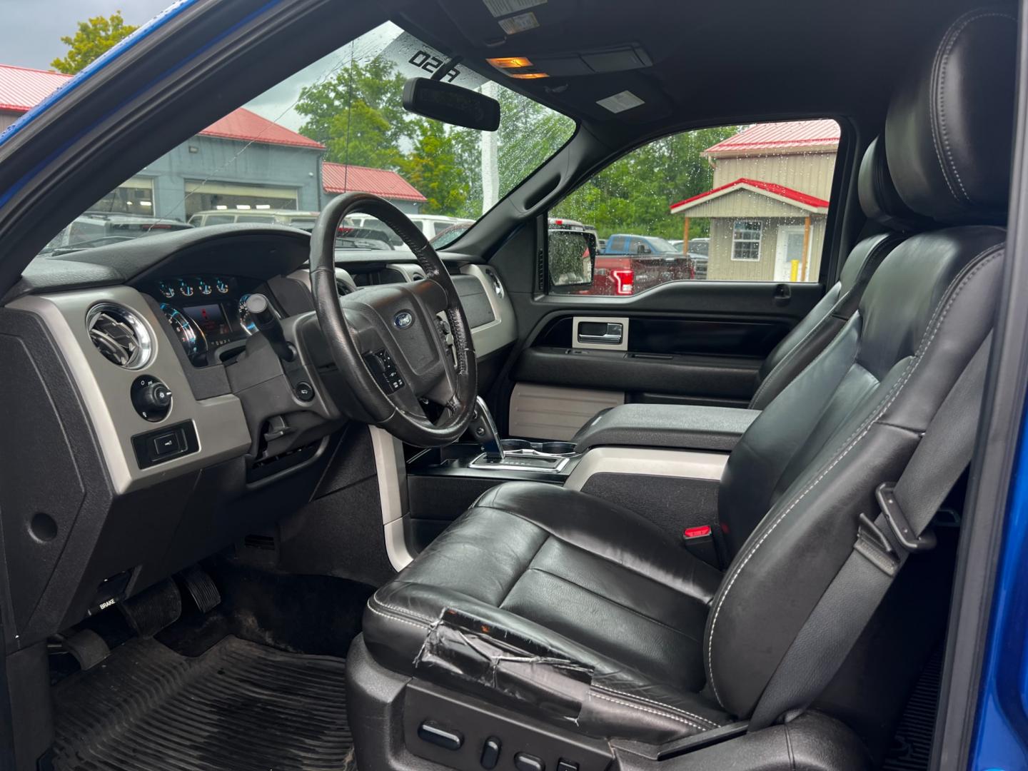 2011 Blue /Black Ford F-150 FX4 SuperCrew 5.5-ft. Bed 4WD (1FTFW1EFXBF) with an 5.0L V8 OHV 32V FFV engine, 6 Speed Auto transmission, located at 547 E. Main St., Orwell, OH, 44076, (440) 437-5893, 41.535435, -80.847855 - Photo#19