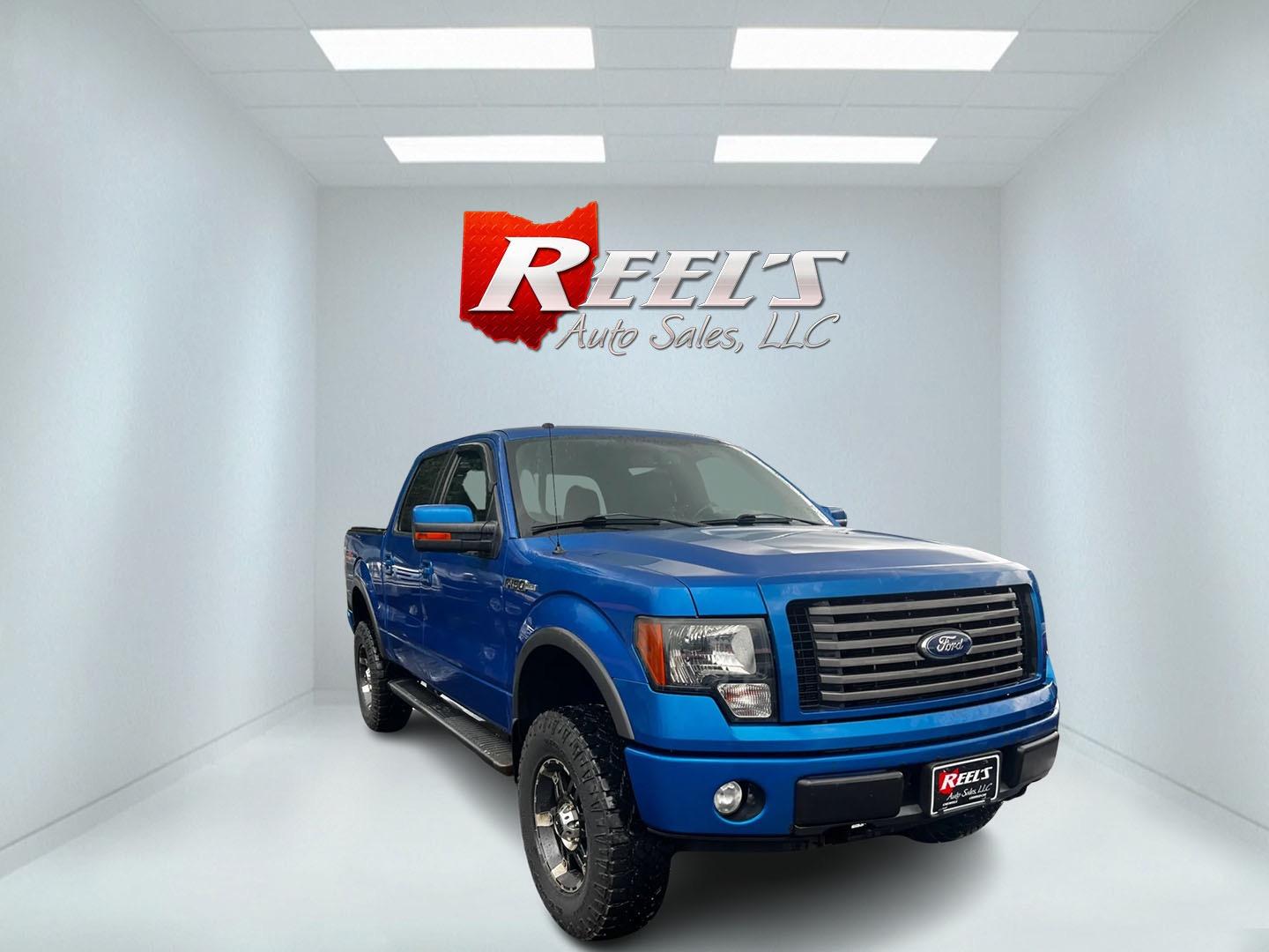 2011 Blue /Black Ford F-150 FX4 SuperCrew 5.5-ft. Bed 4WD (1FTFW1EFXBF) with an 5.0L V8 OHV 32V FFV engine, 6 Speed Auto transmission, located at 547 E. Main St., Orwell, OH, 44076, (440) 437-5893, 41.535435, -80.847855 - This One Owner 2011 Ford F-150 FX4 Crew Cab is a capable and well-equipped full-size pickup truck. It's powered by a robust 5.0-liter Coyote V8 engine, producing 360 horsepower and 380 lb-ft of torque, paired with a 6-speed automatic transmission. This powertrain, combined with 3.73 gearing and a lo - Photo#2