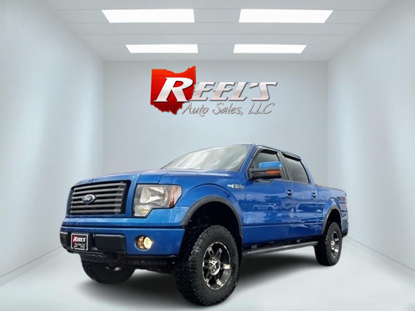 2011 Blue /Black Ford F-150 FX4 SuperCrew 5.5-ft. Bed 4WD (1FTFW1EFXBF) with an 5.0L V8 OHV 32V FFV engine, 6 Speed Auto transmission, located at 547 E. Main St., Orwell, OH, 44076, (440) 437-5893, 41.535435, -80.847855 - This One Owner 2011 Ford F-150 FX4 Crew Cab is a capable and well-equipped full-size pickup truck. It's powered by a robust 5.0-liter Coyote V8 engine, producing 360 horsepower and 380 lb-ft of torque, paired with a 6-speed automatic transmission. This powertrain, combined with 3.73 gearing and a lo - Photo#0