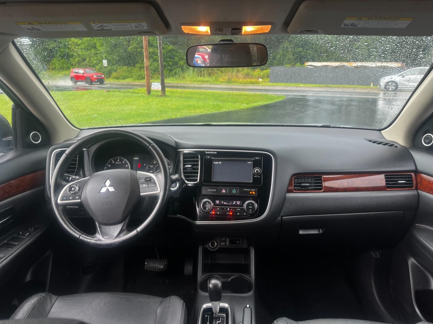 2014 Silver /Black Mitsubishi Outlander SE Premium S-AWC (JA4AZ3A30EZ) with an 2.4L I4 SOHC 16V engine, 6-Speed Automatic transmission, located at 11115 Chardon Rd. , Chardon, OH, 44024, (440) 214-9705, 41.580246, -81.241943 - This 2014 Mitsubishi Outlander SE Premium AWD is a well-equipped compact SUV that offers a blend of comfort, efficiency, and versatility. It features a fuel-efficient 2.4-liter inline-4 engine capable of achieving up to 29 MPG on the highway, making it an economical choice for long trips. The interi - Photo#31