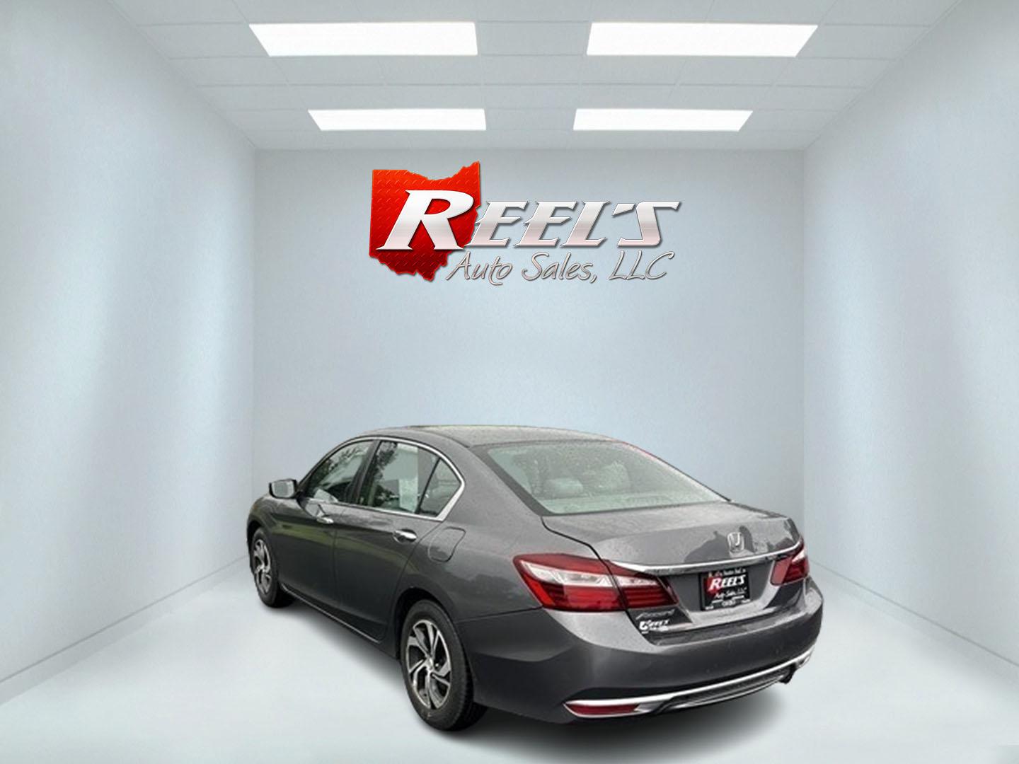 2016 Gray /Gray Honda Accord LX Sedan CVT (1HGCR2F34GA) with an 2.4L I4 DOHC 16V engine, Automatic transmission, located at 547 E. Main St., Orwell, OH, 44076, (440) 437-5893, 41.535435, -80.847855 - This 2016 Honda Accord LX is a well-equipped midsize sedan featuring a fuel-efficient 2.4-liter inline-four Earthdreams engine with VTEC technology, paired with a Continuously Variable Transmission (CVT). This combination delivers impressive fuel economy, achieving 30 MPG combined and 36 MPG on the - Photo#7