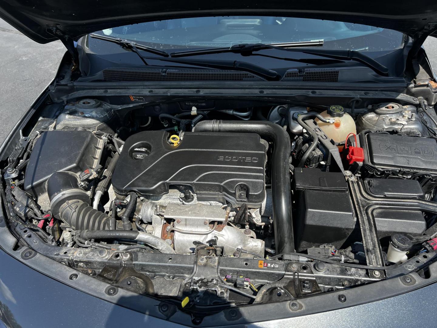 2018 Gray /Black Chevrolet Malibu LT (1G1ZD5STXJF) with an 1.5L I4 DOHC 16V TURBO engine, 6 Speed Auto transmission, located at 547 E. Main St., Orwell, OH, 44076, (440) 437-5893, 41.535435, -80.847855 - This 2018 Chevrolet Malibu LT is a well-equipped midsize sedan featuring a fuel-efficient 1.5-liter turbocharged EcoTec four-cylinder engine paired with a 6-speed automatic transmission, achieving an impressive 36 MPG on the highway. This model offers a luxurious interior with leather upholstery, po - Photo#14