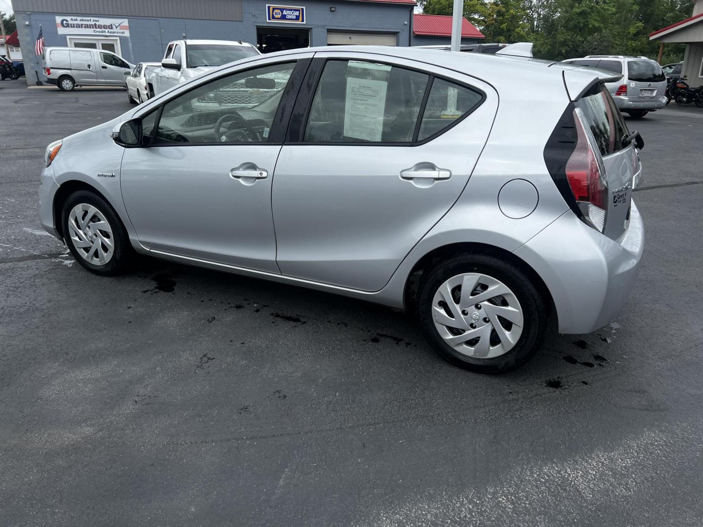 2016 Silver /Black Toyota Prius c Three (JTDKDTB32G1) with an 1.5L I4 DOHC 16V HYBRID engine, Automatic transmission, located at 547 E. Main St., Orwell, OH, 44076, (440) 437-5893, 41.535435, -80.847855 - This 2016 Toyota Prius C Three is a highly fuel-efficient compact hybrid, boasting an impressive 50 MPG combined rating. This eco-friendly model comes equipped with modern features including LED headlights and daytime running lights for improved visibility and energy efficiency. The interior feature - Photo#24