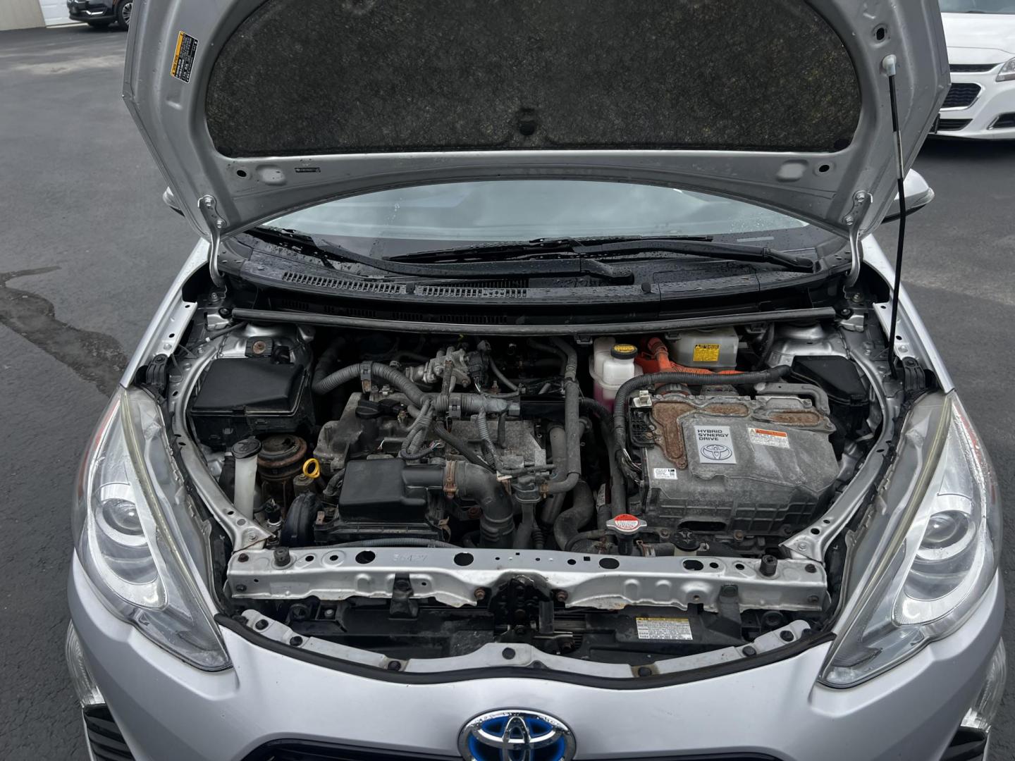 2016 Silver /Black Toyota Prius c Three (JTDKDTB32G1) with an 1.5L I4 DOHC 16V HYBRID engine, Automatic transmission, located at 547 E. Main St., Orwell, OH, 44076, (440) 437-5893, 41.535435, -80.847855 - This 2016 Toyota Prius C Three is a highly fuel-efficient compact hybrid, boasting an impressive 50 MPG combined rating. This eco-friendly model comes equipped with modern features including LED headlights and daytime running lights for improved visibility and energy efficiency. The interior feature - Photo#28