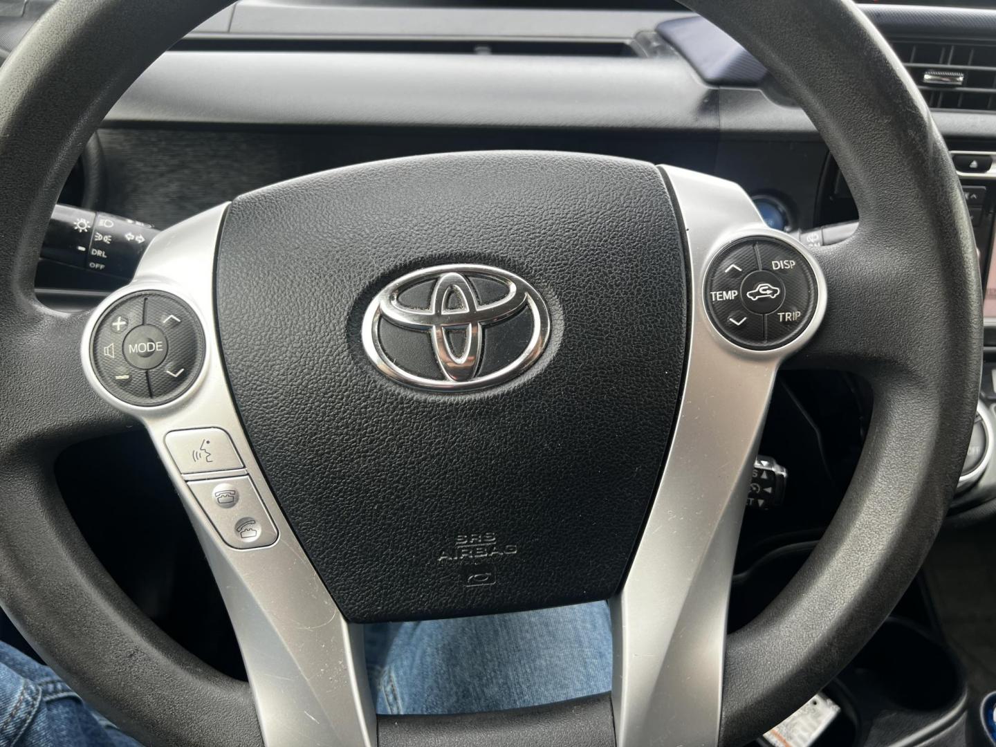 2016 Silver /Black Toyota Prius c Three (JTDKDTB32G1) with an 1.5L I4 DOHC 16V HYBRID engine, Automatic transmission, located at 547 E. Main St., Orwell, OH, 44076, (440) 437-5893, 41.535435, -80.847855 - This 2016 Toyota Prius C Three is a highly fuel-efficient compact hybrid, boasting an impressive 50 MPG combined rating. This eco-friendly model comes equipped with modern features including LED headlights and daytime running lights for improved visibility and energy efficiency. The interior feature - Photo#36