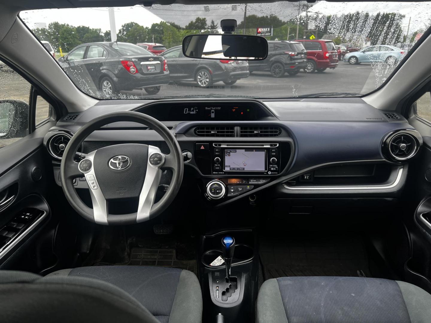 2016 Silver /Black Toyota Prius c Three (JTDKDTB32G1) with an 1.5L I4 DOHC 16V HYBRID engine, Automatic transmission, located at 547 E. Main St., Orwell, OH, 44076, (440) 437-5893, 41.535435, -80.847855 - This 2016 Toyota Prius C Three is a highly fuel-efficient compact hybrid, boasting an impressive 50 MPG combined rating. This eco-friendly model comes equipped with modern features including LED headlights and daytime running lights for improved visibility and energy efficiency. The interior feature - Photo#44