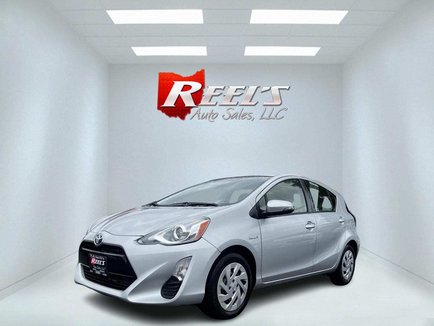 2016 Silver /Black Toyota Prius c Three (JTDKDTB32G1) with an 1.5L I4 DOHC 16V HYBRID engine, Automatic transmission, located at 547 E. Main St., Orwell, OH, 44076, (440) 437-5893, 41.535435, -80.847855 - This 2016 Toyota Prius C Three is a highly fuel-efficient compact hybrid, boasting an impressive 50 MPG combined rating. This eco-friendly model comes equipped with modern features including LED headlights and daytime running lights for improved visibility and energy efficiency. The interior feature - Photo#0