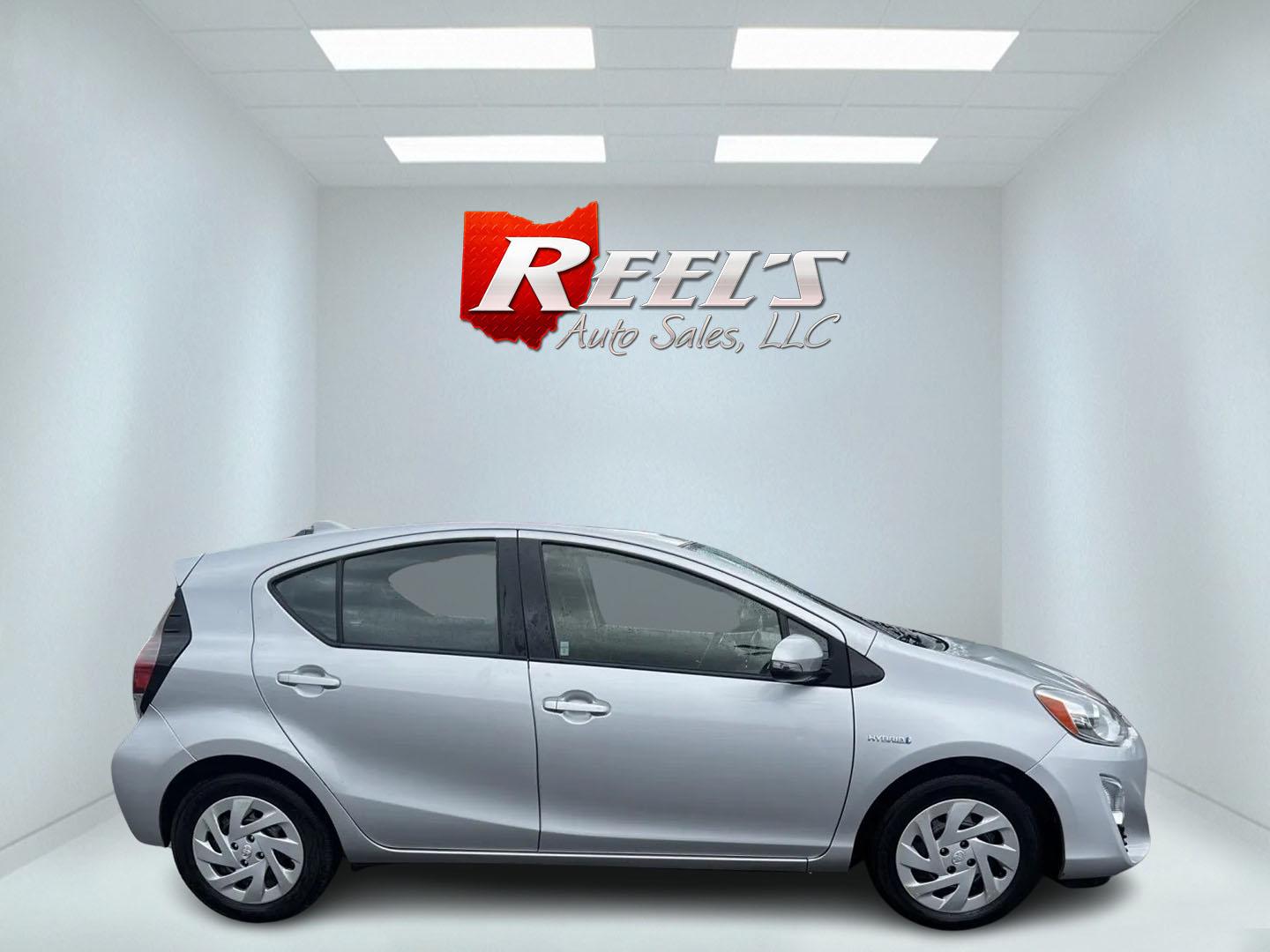 2016 Silver /Black Toyota Prius c Three (JTDKDTB32G1) with an 1.5L I4 DOHC 16V HYBRID engine, Automatic transmission, located at 547 E. Main St., Orwell, OH, 44076, (440) 437-5893, 41.535435, -80.847855 - This 2016 Toyota Prius C Three is a highly fuel-efficient compact hybrid, boasting an impressive 50 MPG combined rating. This eco-friendly model comes equipped with modern features including LED headlights and daytime running lights for improved visibility and energy efficiency. The interior feature - Photo#4