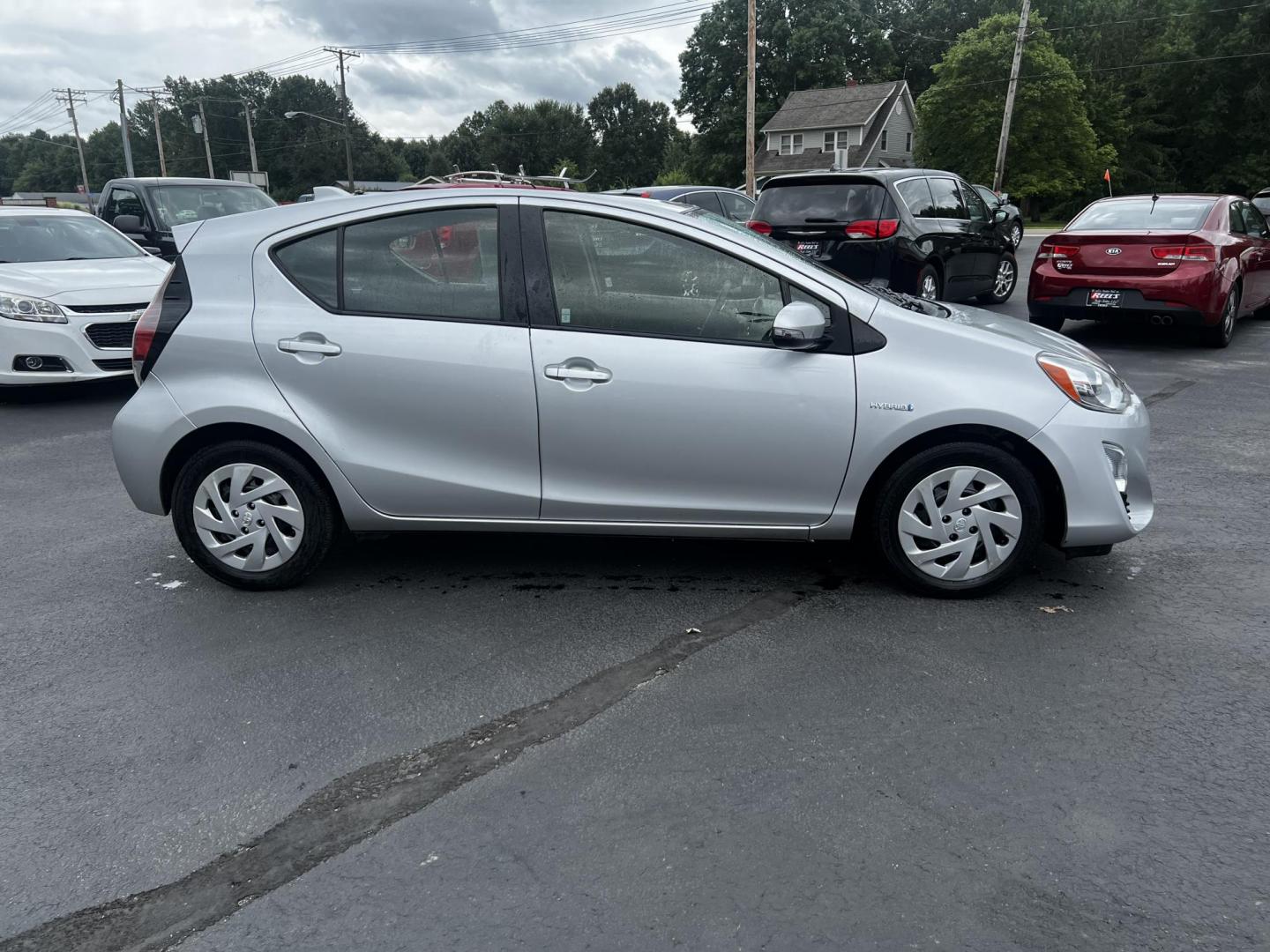 2016 Silver /Black Toyota Prius c Three (JTDKDTB32G1) with an 1.5L I4 DOHC 16V HYBRID engine, Automatic transmission, located at 547 E. Main St., Orwell, OH, 44076, (440) 437-5893, 41.535435, -80.847855 - This 2016 Toyota Prius C Three is a highly fuel-efficient compact hybrid, boasting an impressive 50 MPG combined rating. This eco-friendly model comes equipped with modern features including LED headlights and daytime running lights for improved visibility and energy efficiency. The interior feature - Photo#15