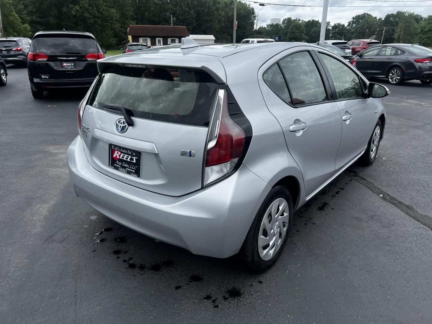 2016 Silver /Black Toyota Prius c Three (JTDKDTB32G1) with an 1.5L I4 DOHC 16V HYBRID engine, Automatic transmission, located at 547 E. Main St., Orwell, OH, 44076, (440) 437-5893, 41.535435, -80.847855 - This 2016 Toyota Prius C Three is a highly fuel-efficient compact hybrid, boasting an impressive 50 MPG combined rating. This eco-friendly model comes equipped with modern features including LED headlights and daytime running lights for improved visibility and energy efficiency. The interior feature - Photo#16