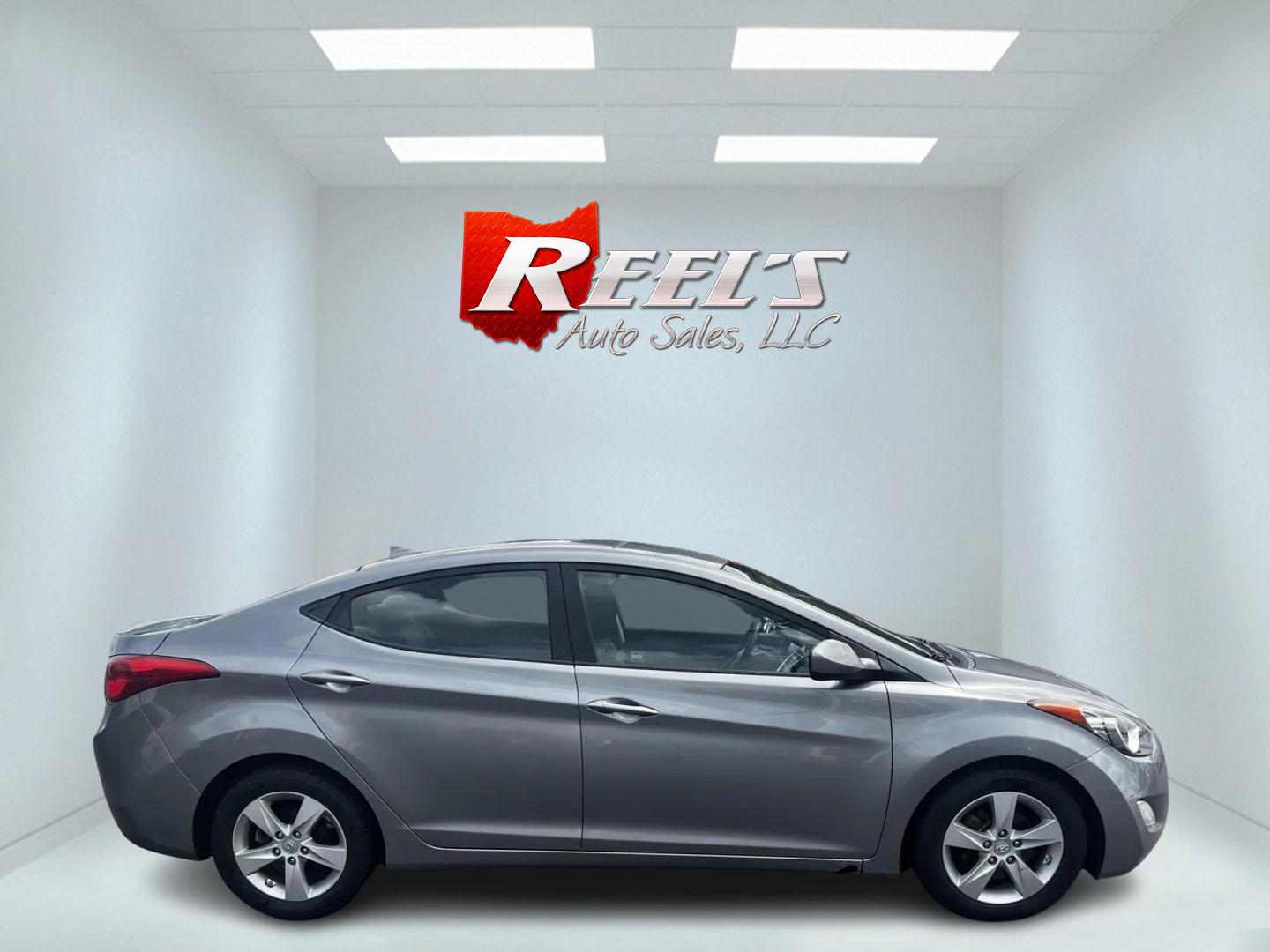 2012 Gray /Gray Hyundai Elantra GLS A/T (KMHDH4AE1CU) with an 1.8L I4 DOHC 16V engine, 6-Speed Automatic transmission, located at 547 E. Main St., Orwell, OH, 44076, (440) 437-5893, 41.535435, -80.847855 - This One Owner 2012 Hyundai Elantra GLS is a compact sedan offering a balanced mix of efficiency and features. It's powered by a 1.8-liter four-cylinder engine paired with a 6-speed automatic transmission, delivering a fuel-efficient performance with an impressive 38 MPG on the highway. Safety is en - Photo#4