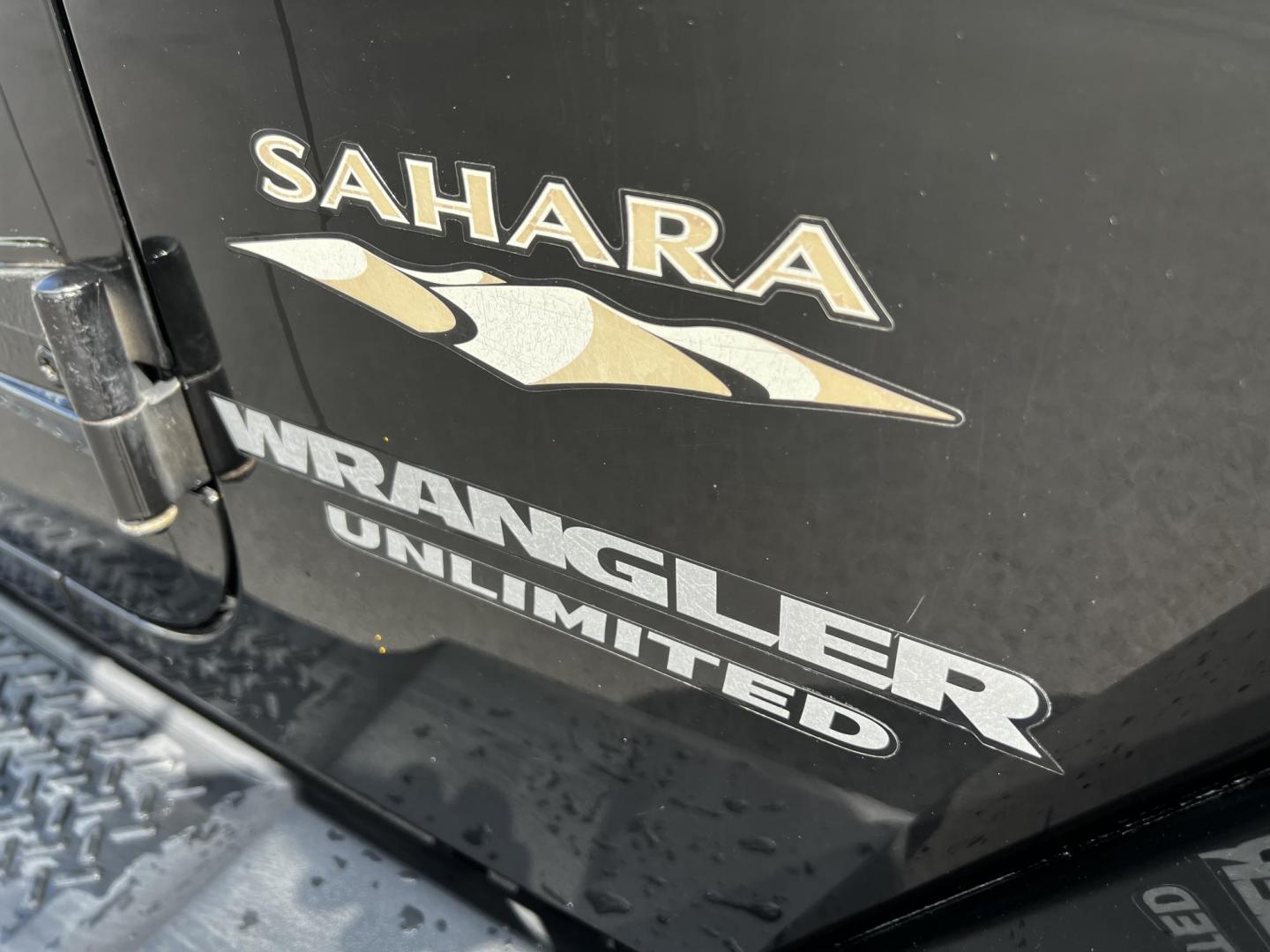 2015 Black /Brown Jeep Wrangler Unlimited Sahara 4WD (1C4BJWEG1FL) with an 3.6L V6 DOHC 24V engine, 5 Speed Auto transmission, located at 11115 Chardon Rd. , Chardon, OH, 44024, (440) 214-9705, 41.580246, -81.241943 - This 2015 Jeep Wrangler Unlimited Sahara is designed for both rugged adventures and urban comfort, powered by a 3.6-liter Pentastar V6 engine paired with a 5-speed automatic transmission. Its trail-rated capability is complemented by Dana 30 front and Dana 44 rear axles, making it well-suited for of - Photo#10