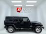 2015 Black /Brown Jeep Wrangler Unlimited Sahara 4WD (1C4BJWEG1FL) with an 3.6L V6 DOHC 24V engine, 5 Speed Auto transmission, located at 11115 Chardon Rd. , Chardon, OH, 44024, (440) 214-9705, 41.580246, -81.241943 - This 2015 Jeep Wrangler Unlimited Sahara is designed for both rugged adventures and urban comfort, powered by a 3.6-liter Pentastar V6 engine paired with a 5-speed automatic transmission. Its trail-rated capability is complemented by Dana 30 front and Dana 44 rear axles, making it well-suited for of - Photo#4