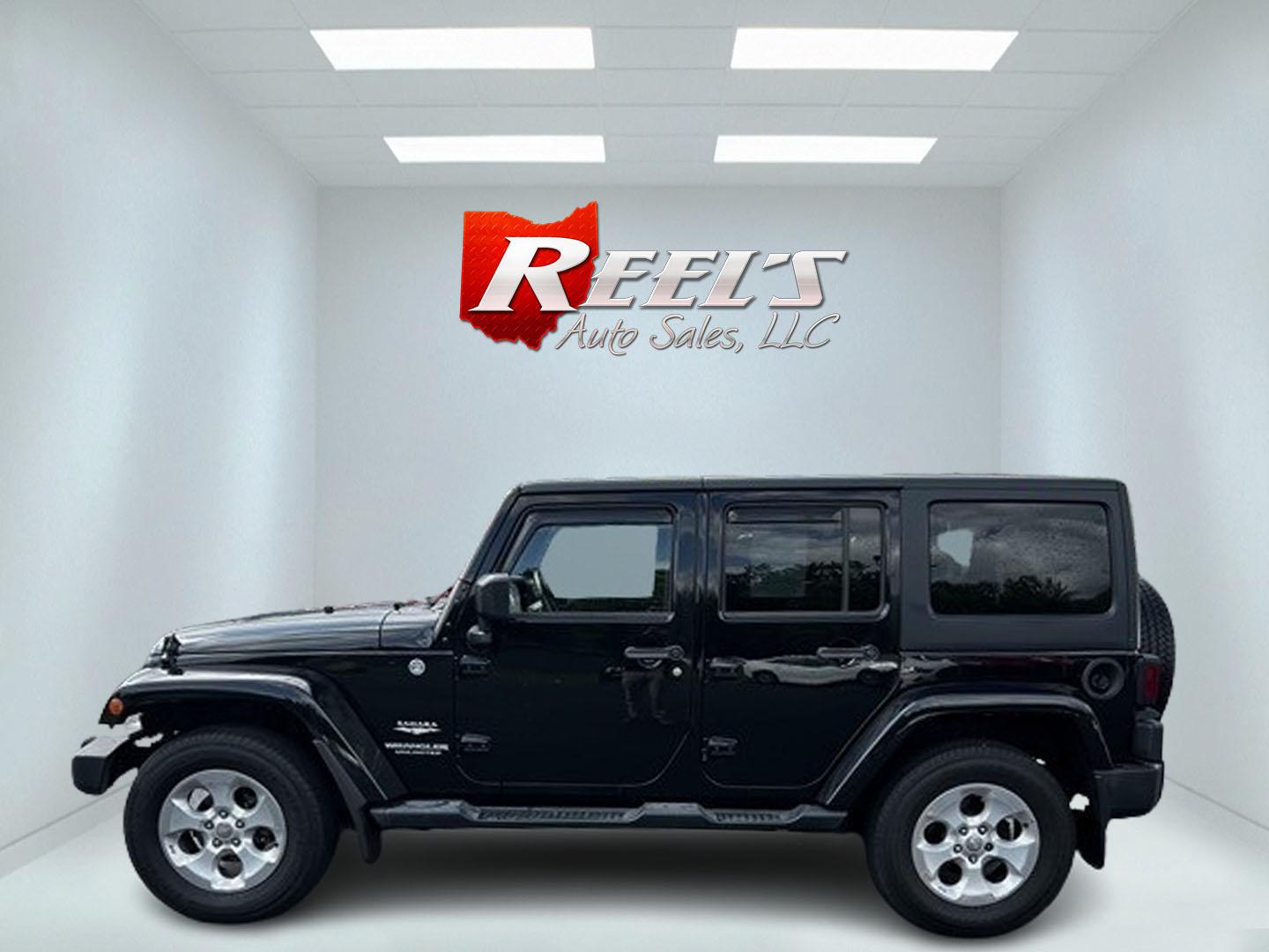 2015 Black /Brown Jeep Wrangler Unlimited Sahara 4WD (1C4BJWEG1FL) with an 3.6L V6 DOHC 24V engine, 5 Speed Auto transmission, located at 11115 Chardon Rd. , Chardon, OH, 44024, (440) 214-9705, 41.580246, -81.241943 - This 2015 Jeep Wrangler Unlimited Sahara is designed for both rugged adventures and urban comfort, powered by a 3.6-liter Pentastar V6 engine paired with a 5-speed automatic transmission. Its trail-rated capability is complemented by Dana 30 front and Dana 44 rear axles, making it well-suited for of - Photo#9