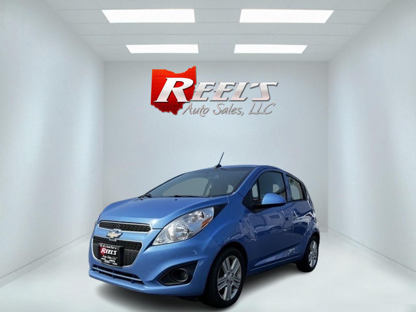 2014 Blue /Black Chevrolet Spark LS Auto (KL8CB6S9XEC) with an 1.2L I4 16V DOHC engine, Automatic transmission, located at 11115 Chardon Rd. , Chardon, OH, 44024, (440) 214-9705, 41.580246, -81.241943 - This 2014 Chevrolet Spark LS is a compact hatchback equipped with a 1.2 I4 engine and a CVT transmission, designed to offer efficiency and practicality for urban driving. It features daytime running lights and dusk-sensing headlights for improved visibility and safety. The Spark delivers a respectab - Photo#0