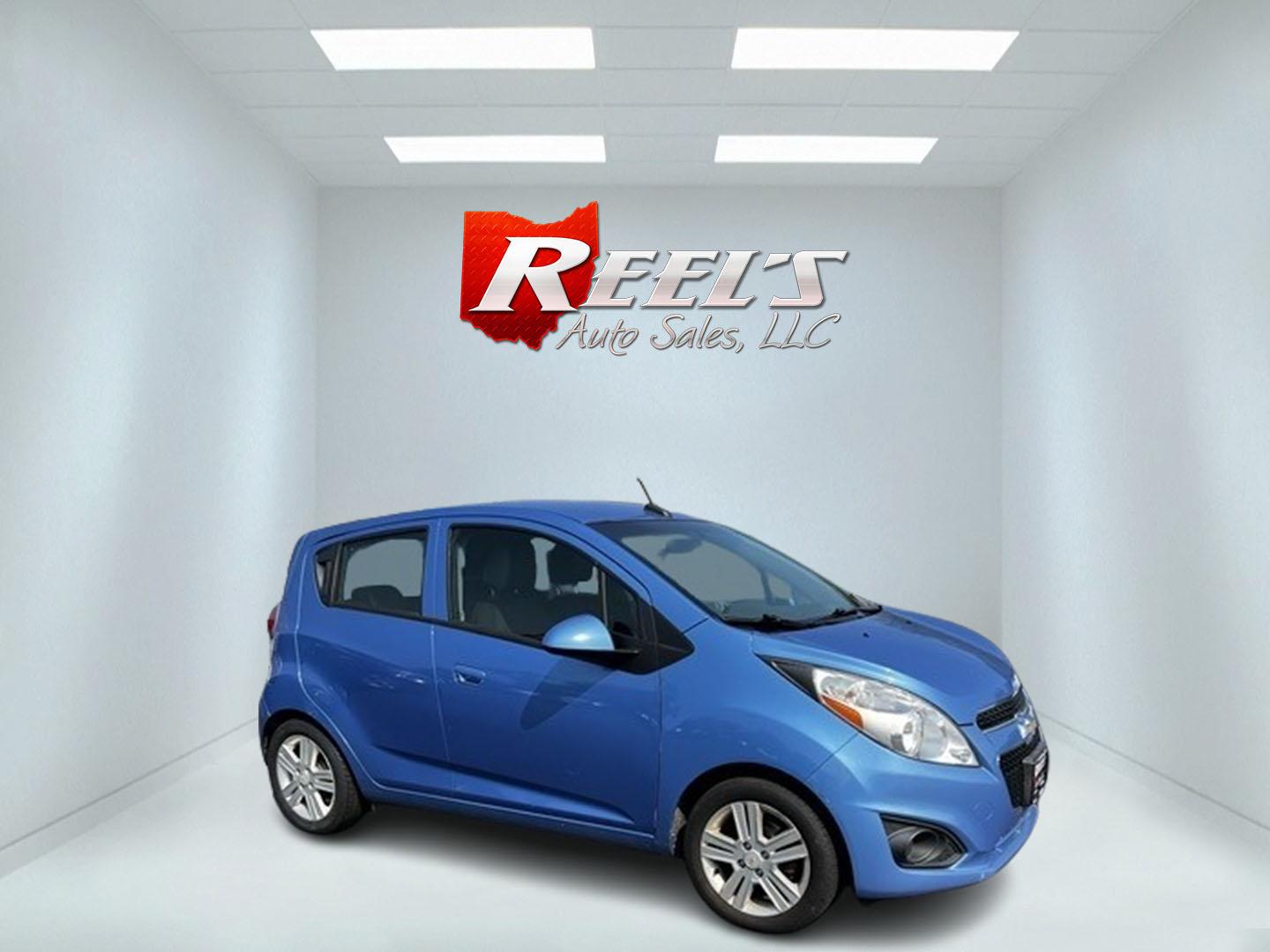 2014 Blue /Black Chevrolet Spark LS Auto (KL8CB6S9XEC) with an 1.2L I4 16V DOHC engine, Automatic transmission, located at 11115 Chardon Rd. , Chardon, OH, 44024, (440) 214-9705, 41.580246, -81.241943 - This 2014 Chevrolet Spark LS is a compact hatchback equipped with a 1.2 I4 engine and a CVT transmission, designed to offer efficiency and practicality for urban driving. It features daytime running lights and dusk-sensing headlights for improved visibility and safety. The Spark delivers a respectab - Photo#3