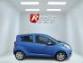 2014 Blue /Black Chevrolet Spark LS Auto (KL8CB6S9XEC) with an 1.2L I4 16V DOHC engine, Automatic transmission, located at 11115 Chardon Rd. , Chardon, OH, 44024, (440) 214-9705, 41.580246, -81.241943 - This 2014 Chevrolet Spark LS is a compact hatchback equipped with a 1.2 I4 engine and a CVT transmission, designed to offer efficiency and practicality for urban driving. It features daytime running lights and dusk-sensing headlights for improved visibility and safety. The Spark delivers a respectab - Photo#4