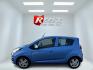 2014 Blue /Black Chevrolet Spark LS Auto (KL8CB6S9XEC) with an 1.2L I4 16V DOHC engine, Automatic transmission, located at 11115 Chardon Rd. , Chardon, OH, 44024, (440) 214-9705, 41.580246, -81.241943 - This 2014 Chevrolet Spark LS is a compact hatchback equipped with a 1.2 I4 engine and a CVT transmission, designed to offer efficiency and practicality for urban driving. It features daytime running lights and dusk-sensing headlights for improved visibility and safety. The Spark delivers a respectab - Photo#8