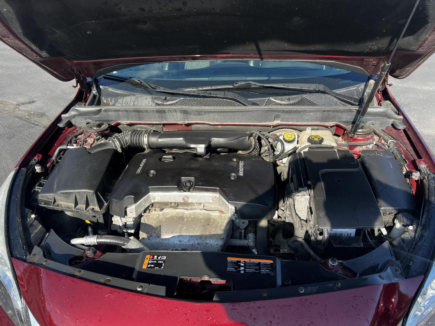 2016 Red /Black Chevrolet Malibu Limited 1LT (1G11C5SA4GF) with an 2.5L I4 DOHC 16V engine, 6-Speed Automatic transmission, located at 11115 Chardon Rd. , Chardon, OH, 44024, (440) 214-9705, 41.580246, -81.241943 - This 2016 Chevrolet Malibu Limited LT is equipped with a 2.5-liter EcoTec engine mated to a 6-speed automatic transmission, offering a combined fuel efficiency of 33 MPG. Noteworthy features include daytime running lights and dusk-sensing headlights for enhanced visibility, a power driver's seat for - Photo#13