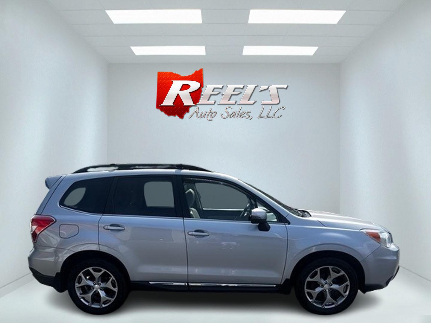 2015 Silver /Gray Subaru Forester 2.5i Touring (JF2SJAWC4FH) with an 2.5L H4 SOHC 16V engine, Automatic transmission, located at 547 E. Main St., Orwell, OH, 44076, (440) 437-5893, 41.535435, -80.847855 - Photo#4