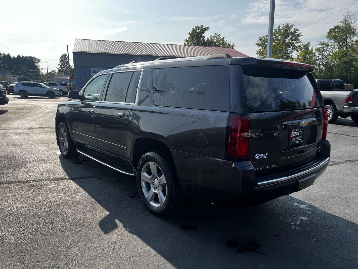 2017 Gray /Black Chevrolet Suburban Premier 4WD (1GNSKJKCXHR) with an 5.3L V8 OHV 16V engine, 6-Speed Automatic transmission, located at 547 E. Main St., Orwell, OH, 44076, (440) 437-5893, 41.535435, -80.847855 - This 2017 Chevrolet Suburban Premier 4WD is a robust full-size SUV powered by a 5.3-liter V8 Vortec engine with a 6-speed automatic transmission, offering a towing capacity of 6,000 pounds and equipped with a G80 locking rear differential and 3.08 gearing. It boasts an array of luxury and technology - Photo#11