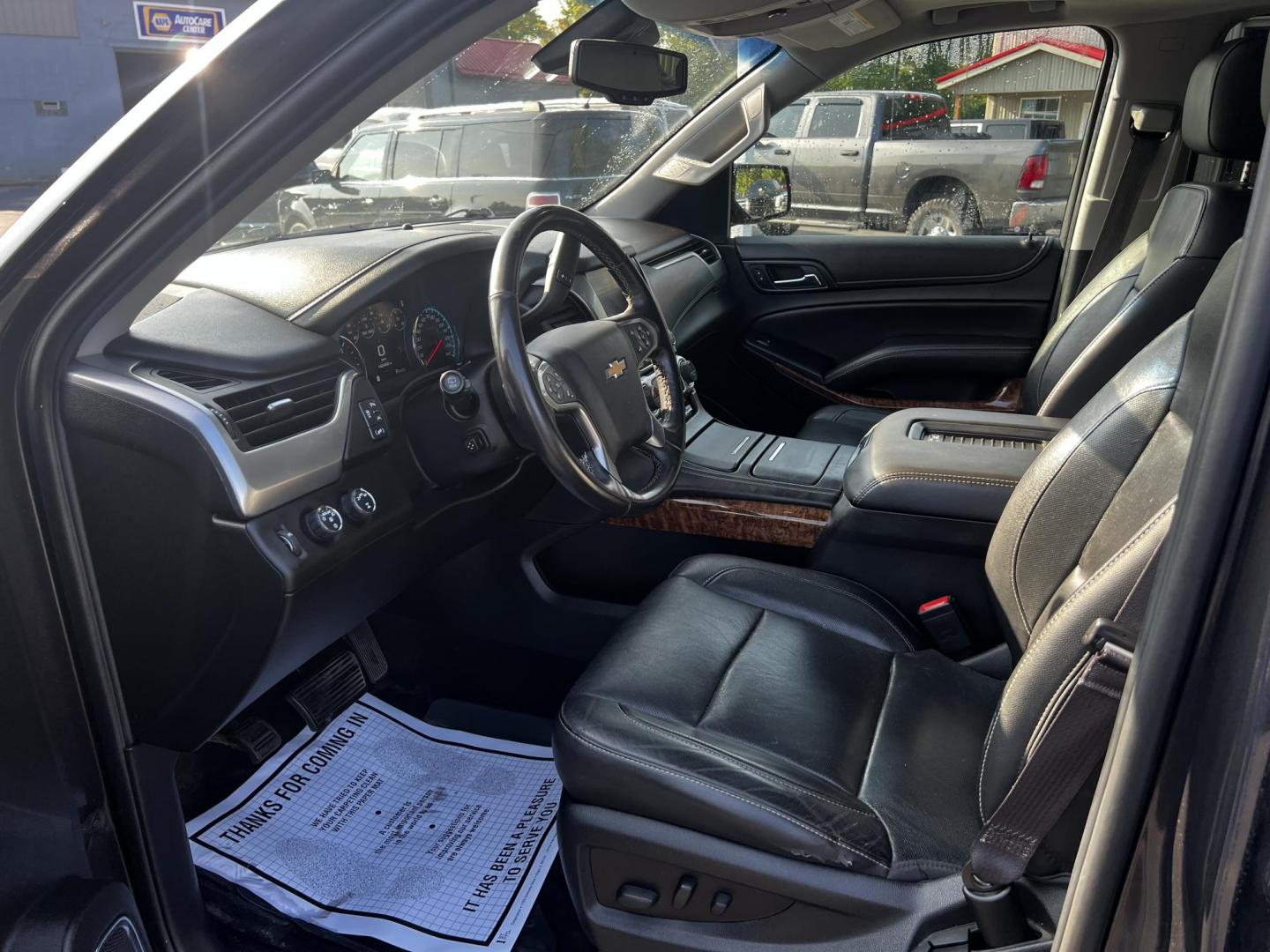 2017 Gray /Black Chevrolet Suburban Premier 4WD (1GNSKJKCXHR) with an 5.3L V8 OHV 16V engine, 6-Speed Automatic transmission, located at 547 E. Main St., Orwell, OH, 44076, (440) 437-5893, 41.535435, -80.847855 - This 2017 Chevrolet Suburban Premier 4WD is a robust full-size SUV powered by a 5.3-liter V8 Vortec engine with a 6-speed automatic transmission, offering a towing capacity of 6,000 pounds and equipped with a G80 locking rear differential and 3.08 gearing. It boasts an array of luxury and technology - Photo#18